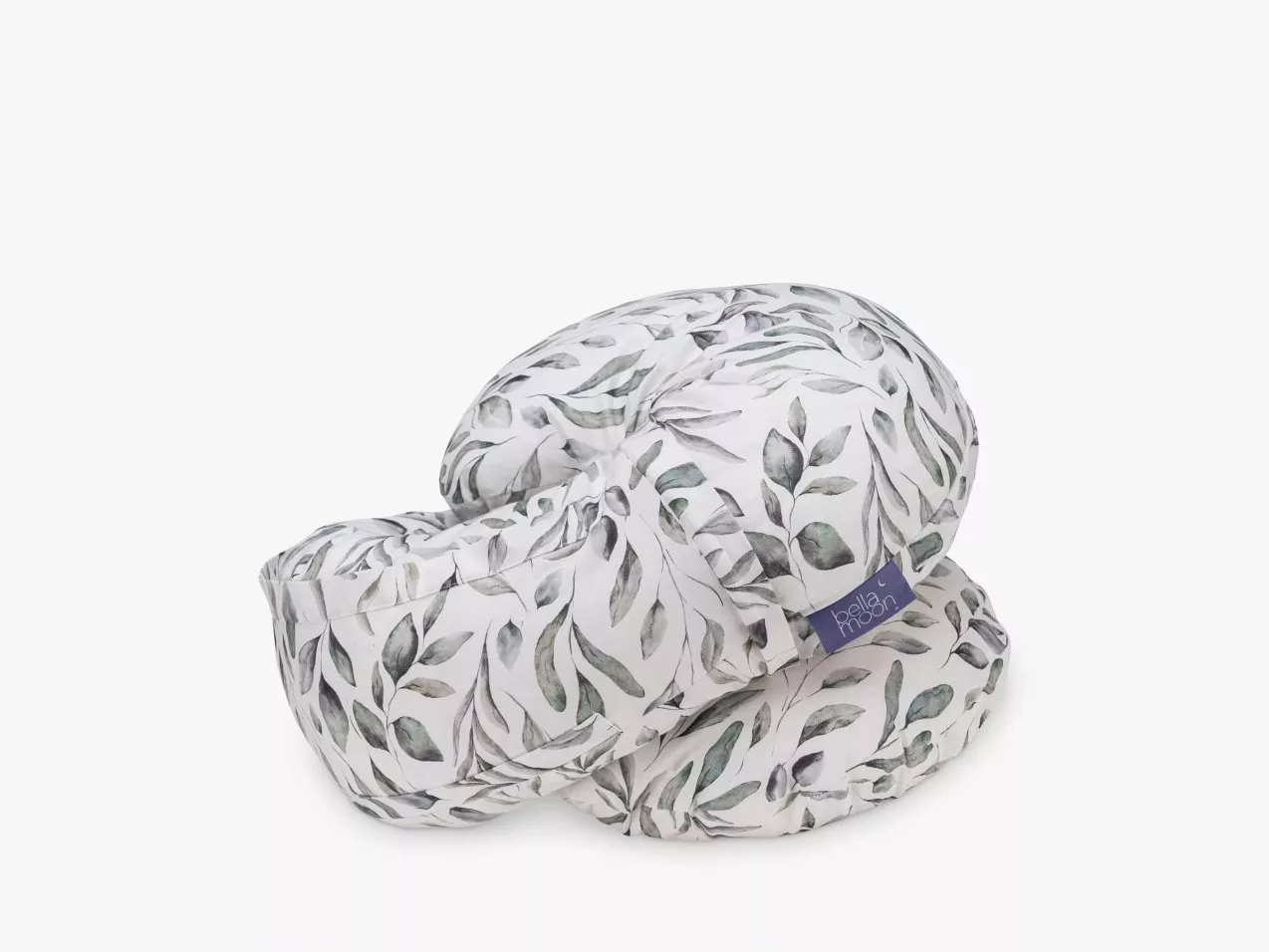 Floral baby nursing pillow with leafy print, supportive breastfeeding cushion for comfortable feeding and lounging