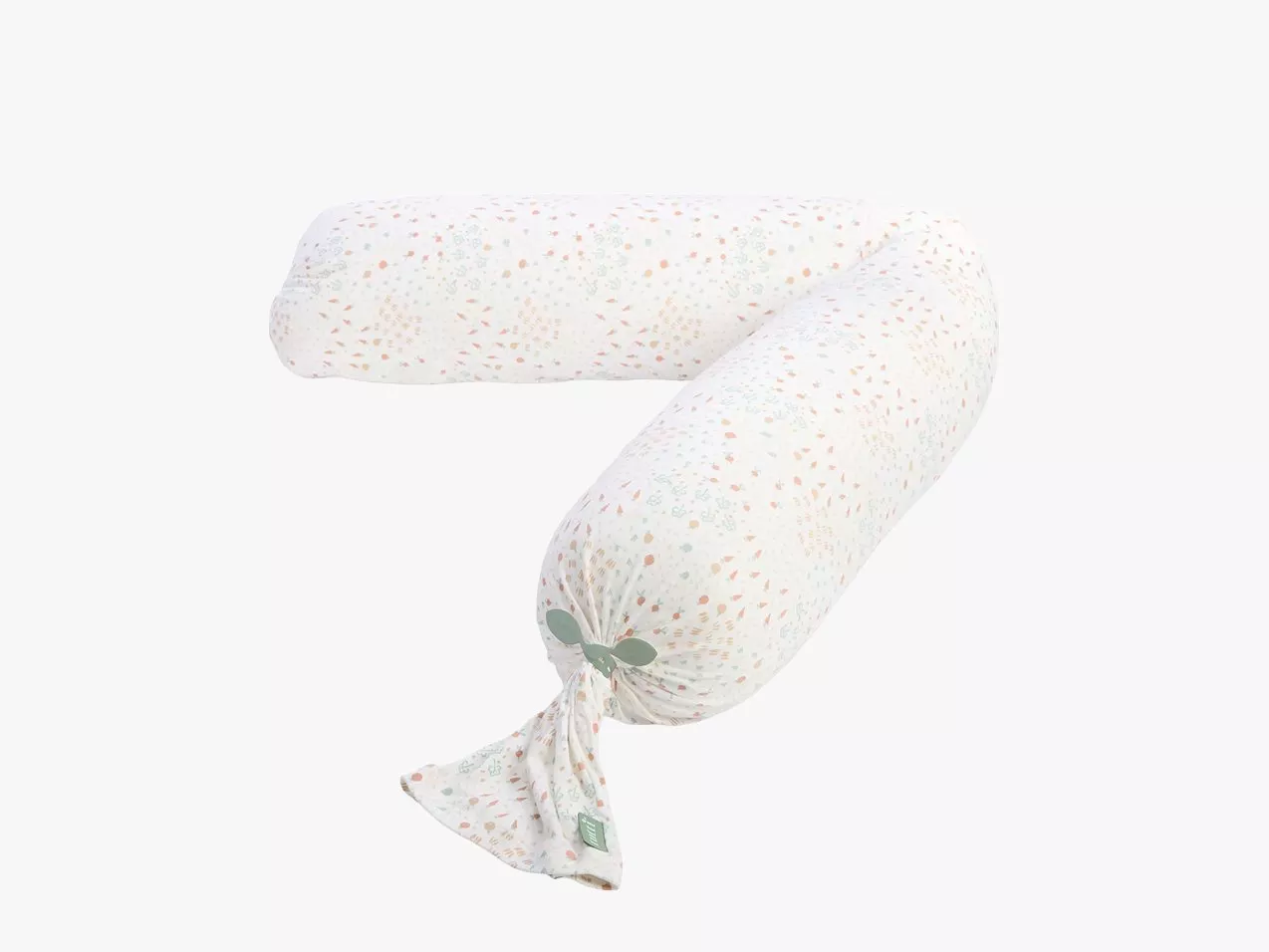 White U-shaped pregnancy and nursing pillow with pastel confetti print, ideal maternity back and side support