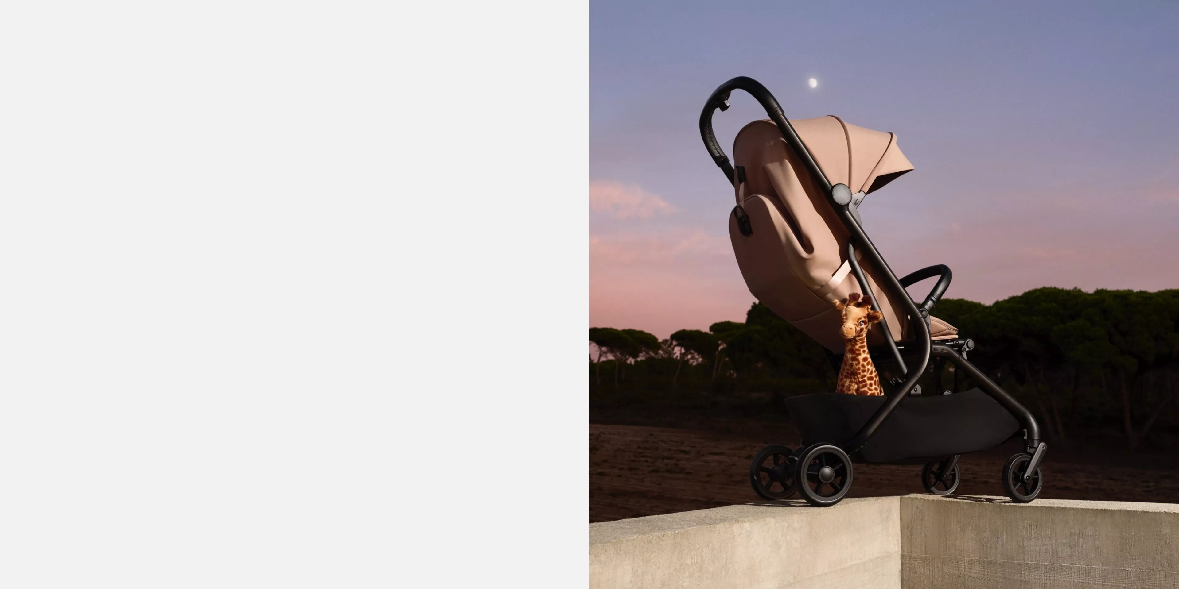 Beige baby pushchair and pram with a cute giraffe toy, outdoors at dusk under a pastel sky and moon