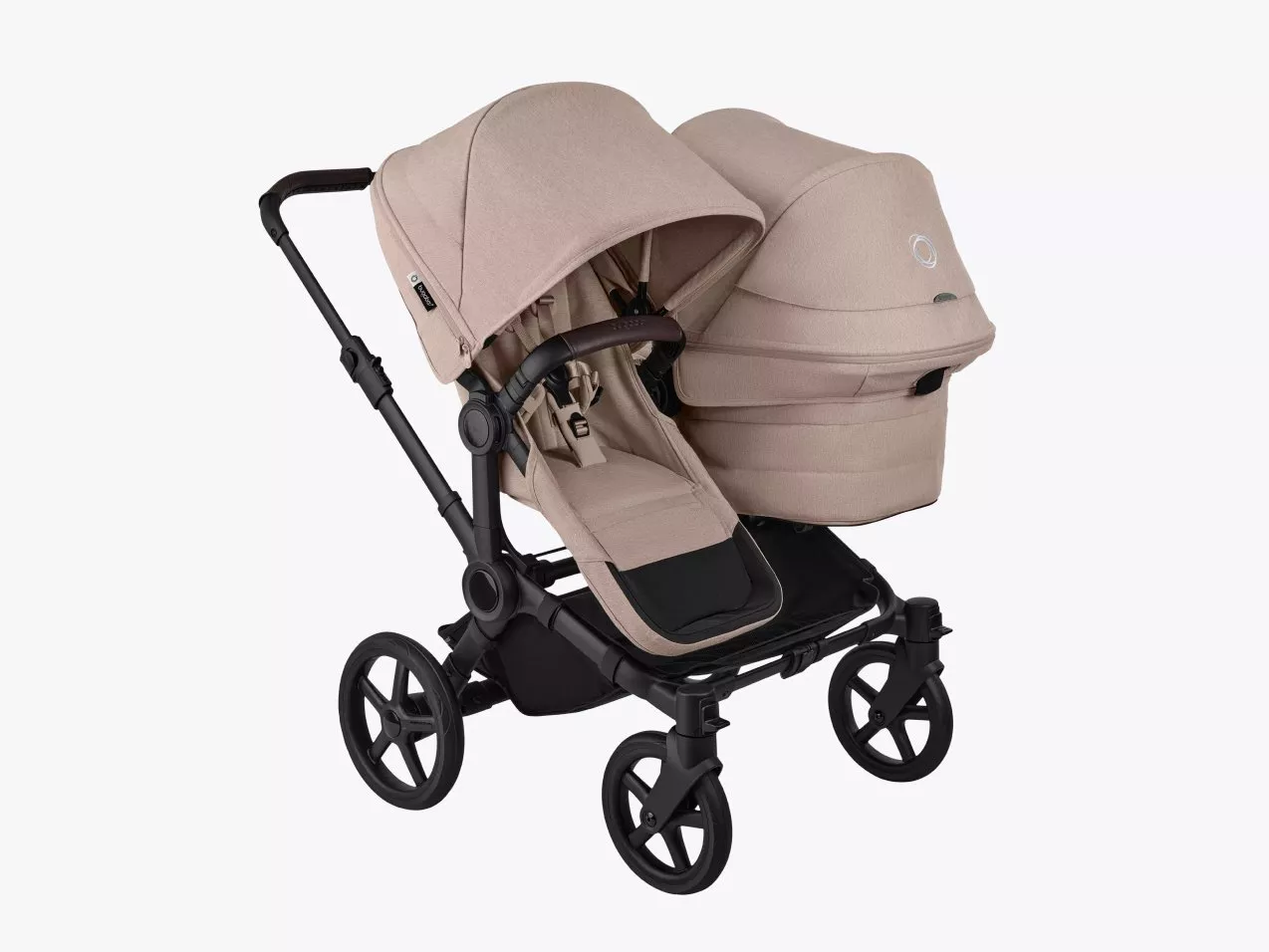 Beige convertible baby pushchair and carrycot travel system with large wheels and adjustable canopy
