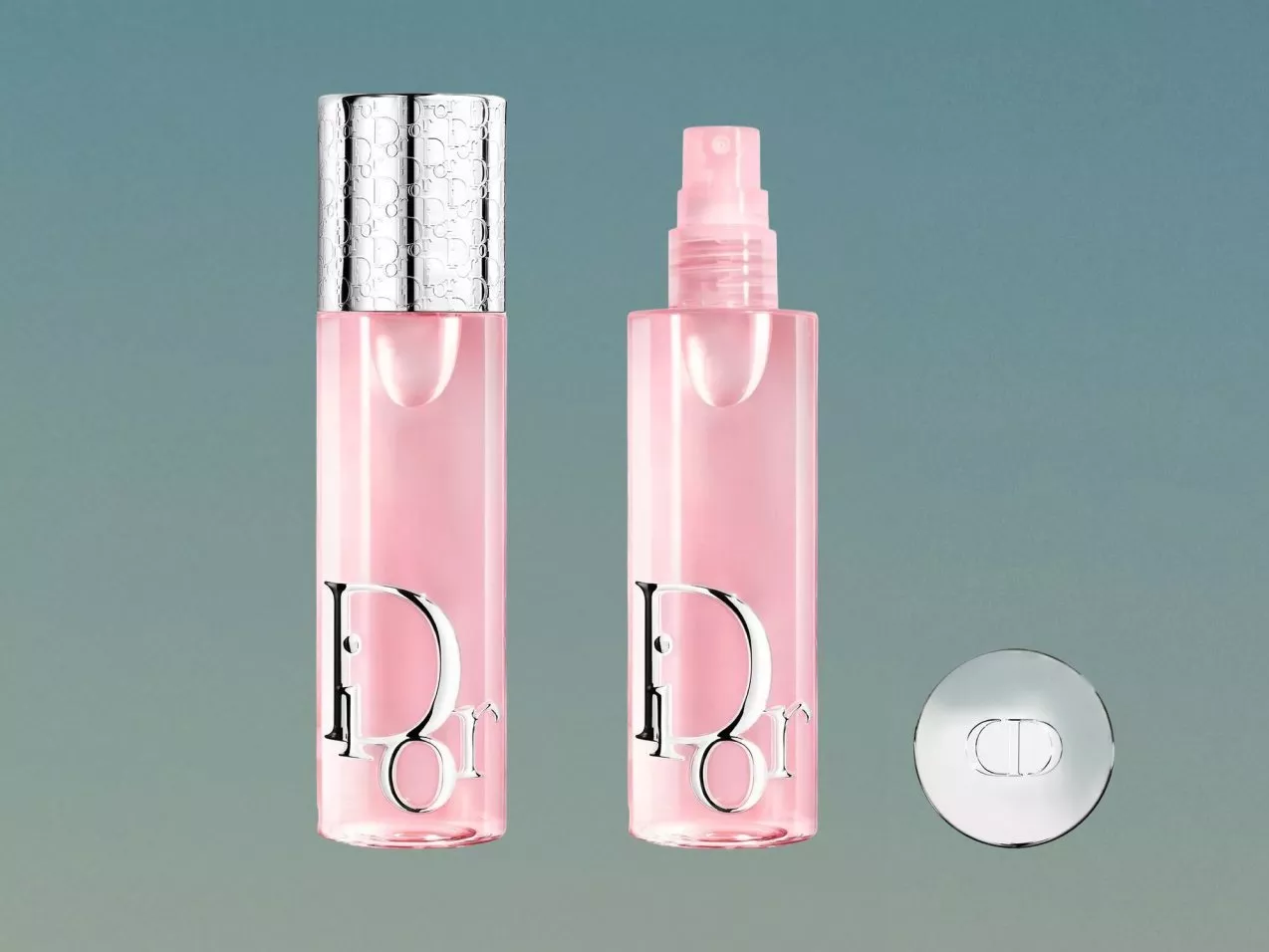 Pink Dior skincare mist spray bottle with silver cap and logo, product packshot on grey background