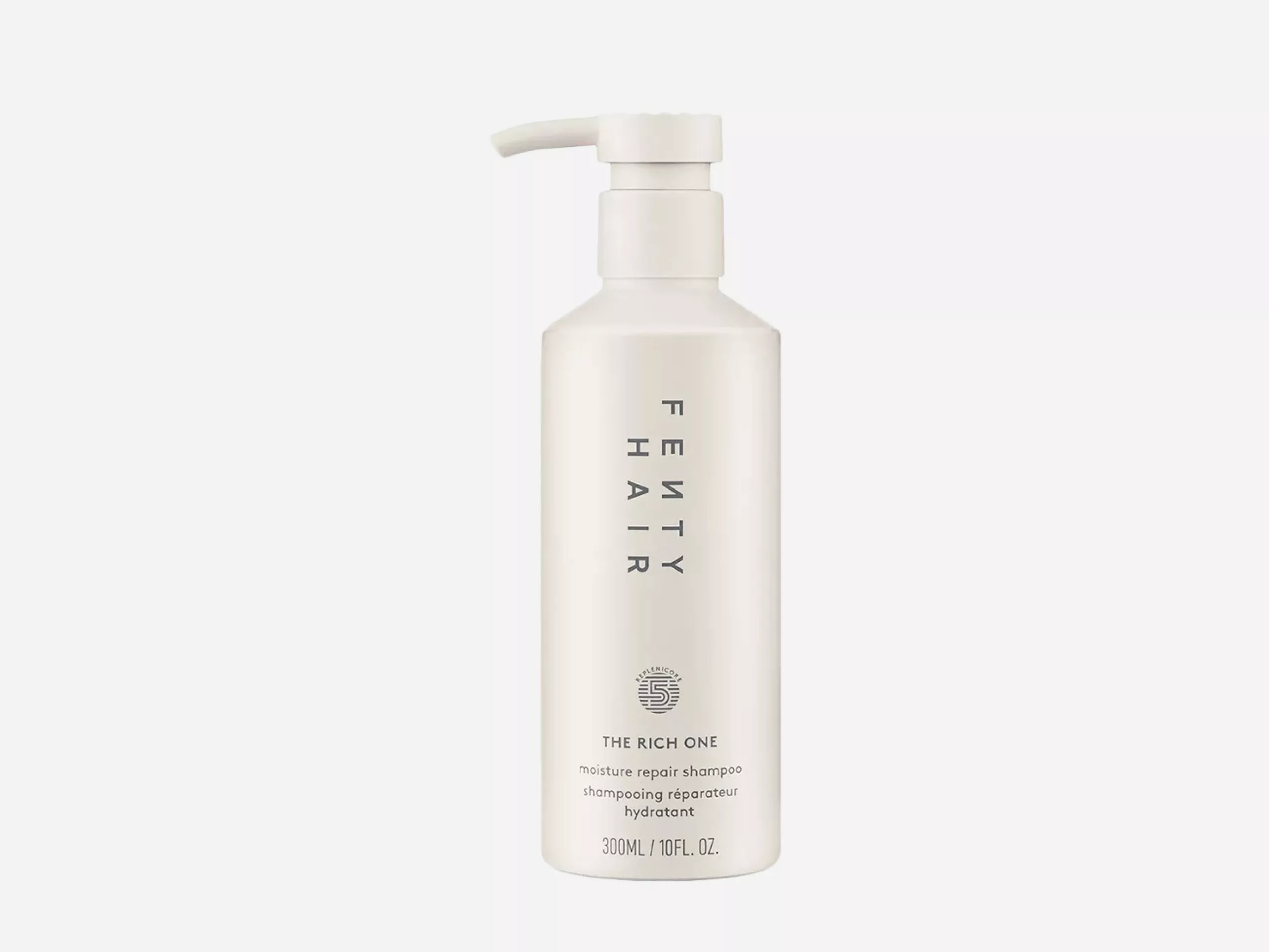Fenty Hair The Rich One moisture repair shampoo pump bottle, 300ml, white packaging on plain background