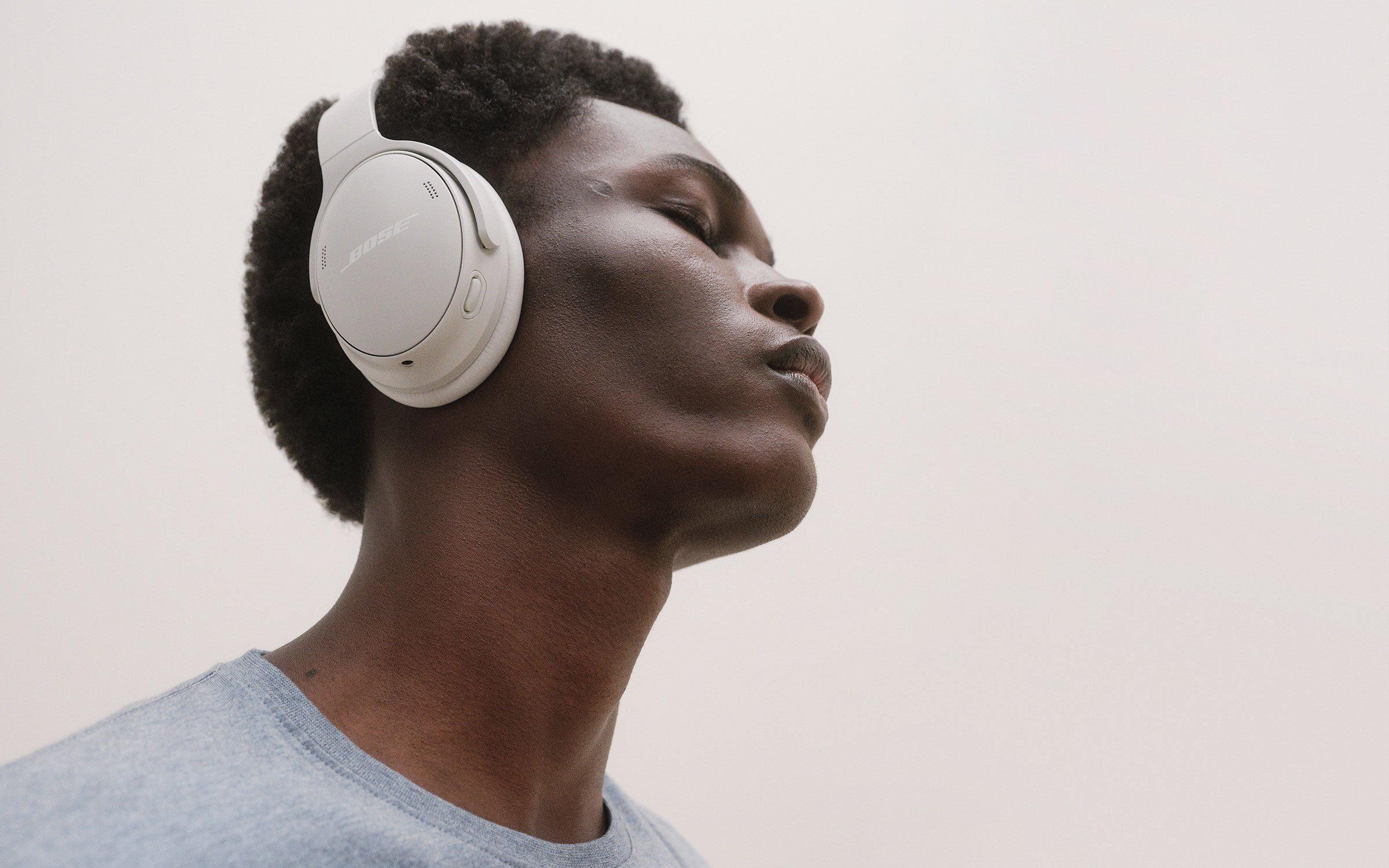 Man wearing white headphones