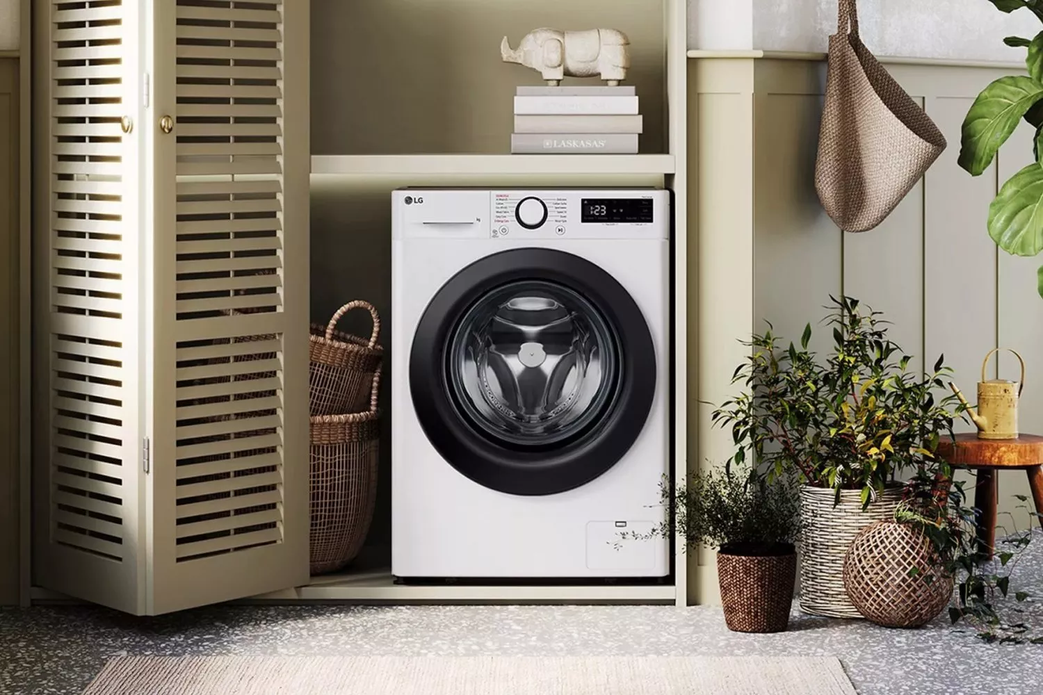 Modern front-loading washing machine in a stylish utility cupboard with wicker baskets and indoor plants