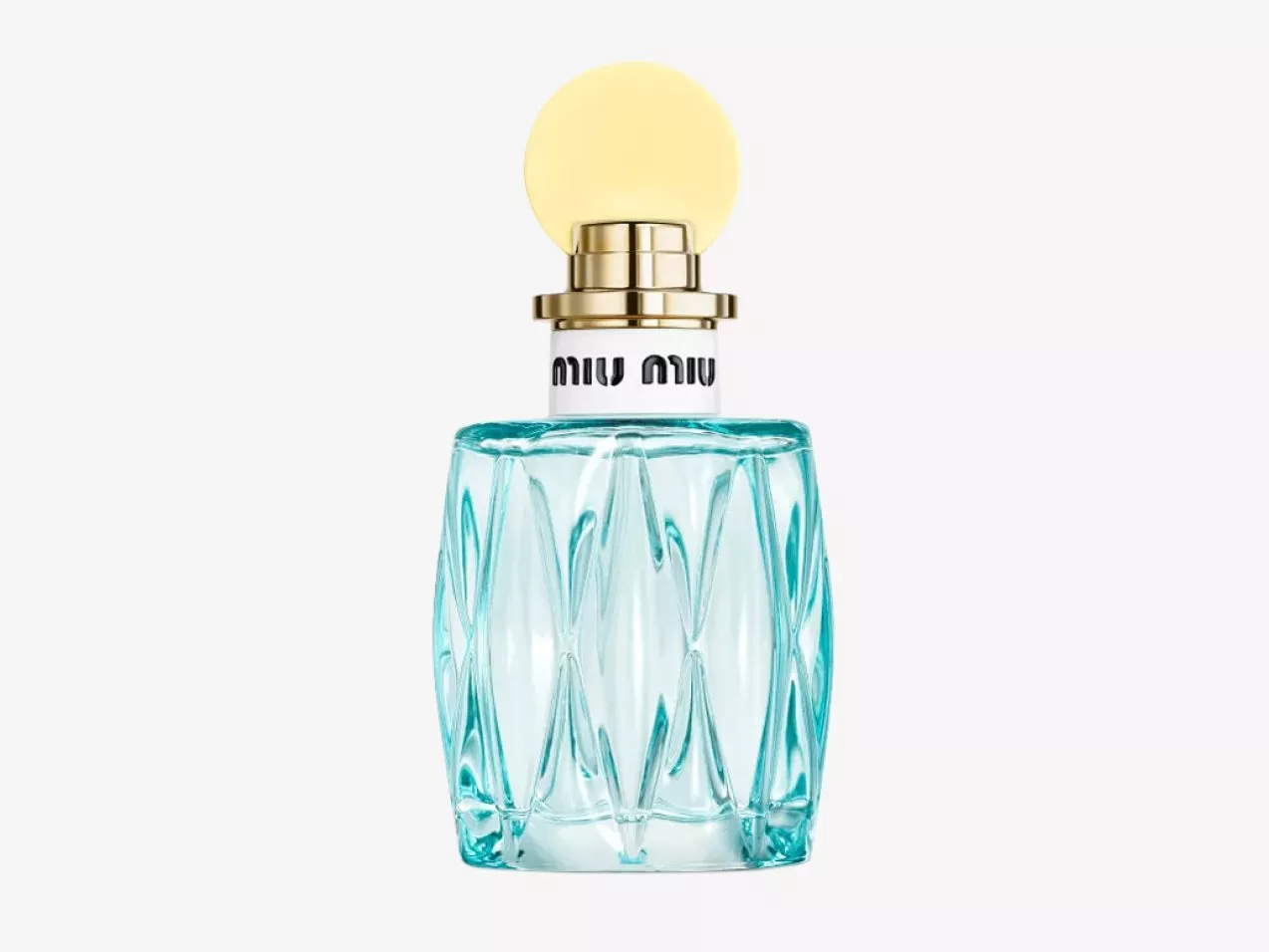 Miu Miu perfume bottle with faceted turquoise glass and gold cap, product photo on a white background