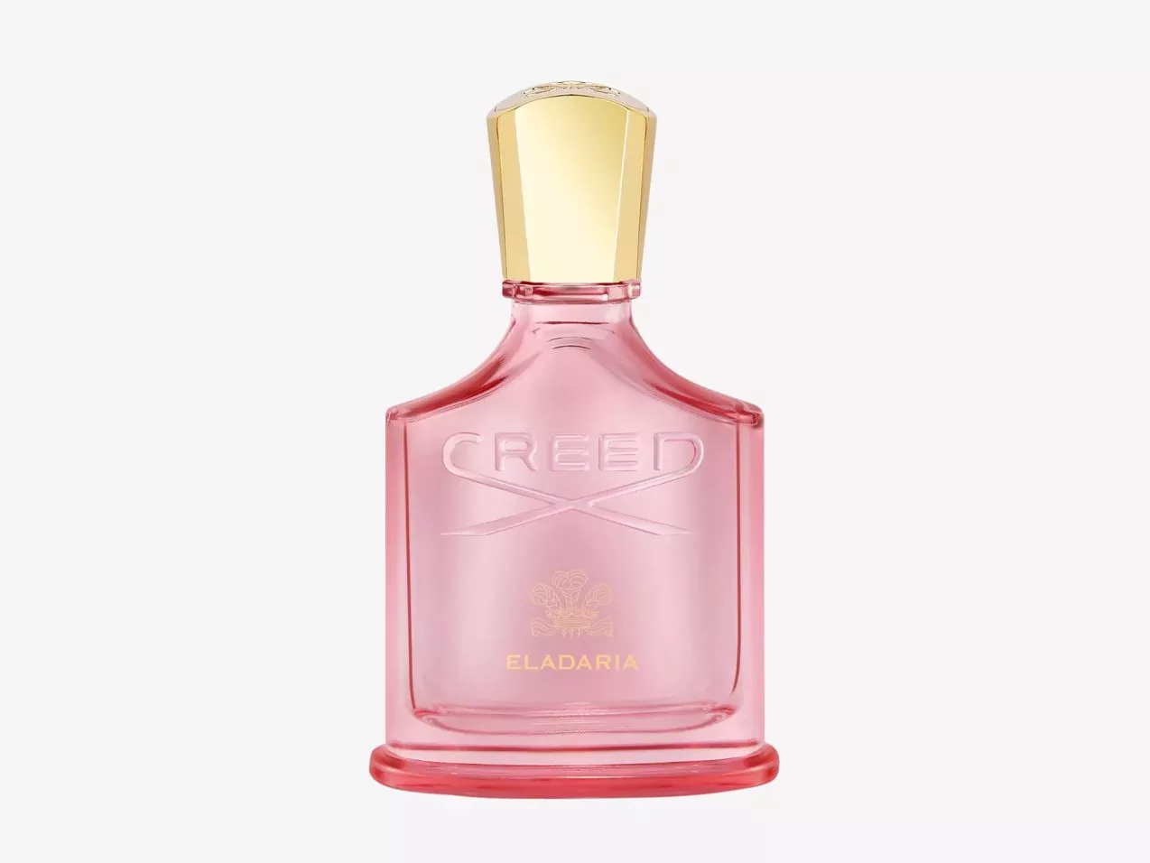 Creed Eladaria perfume bottle in pink glass with gold cap, luxury fragrance product photo on white background