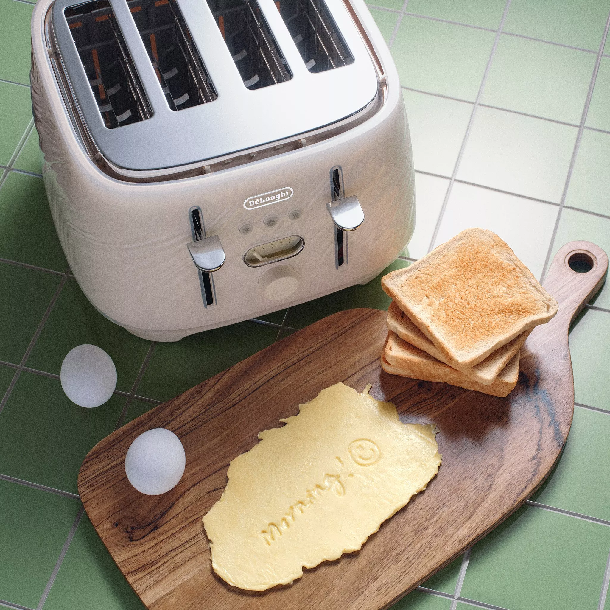 sliver delonghi toaster with toast and eggs on a brown mini tray