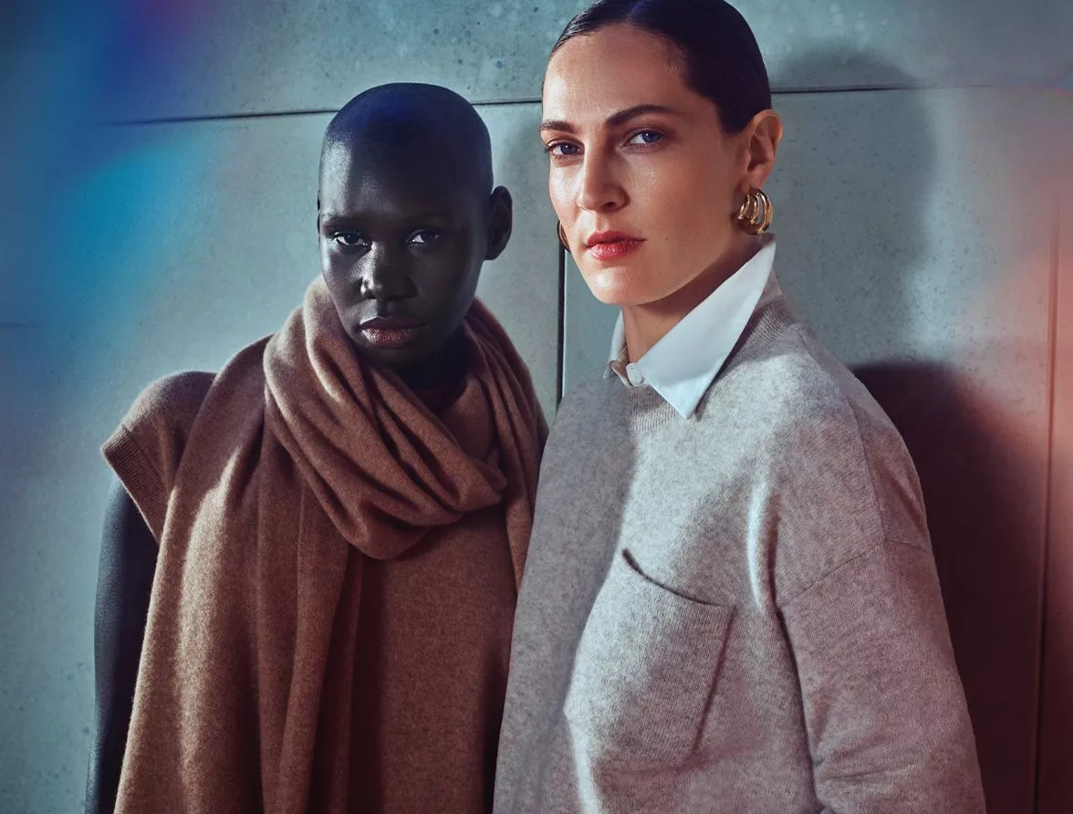 Two female models wearing cashmere jumpers