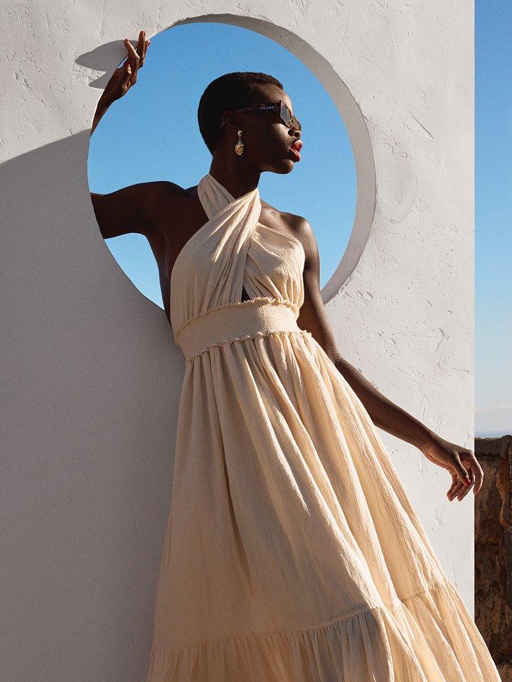 Female model wearing linen maxi summer dress