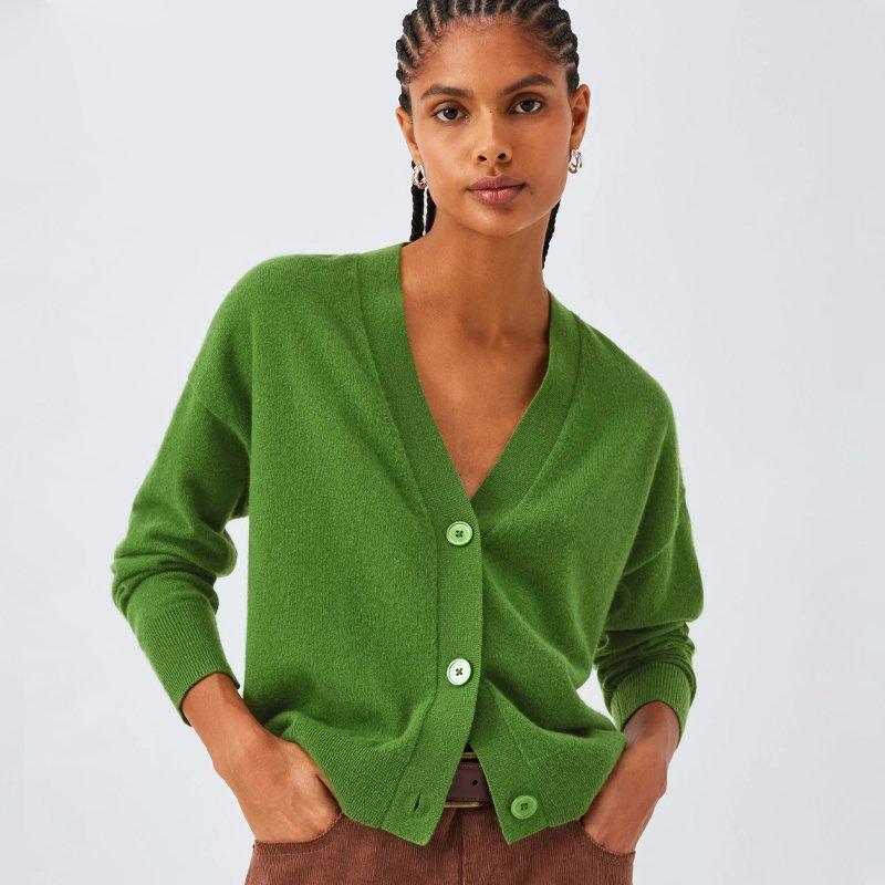 Female model wearing a green cashmere cardgian