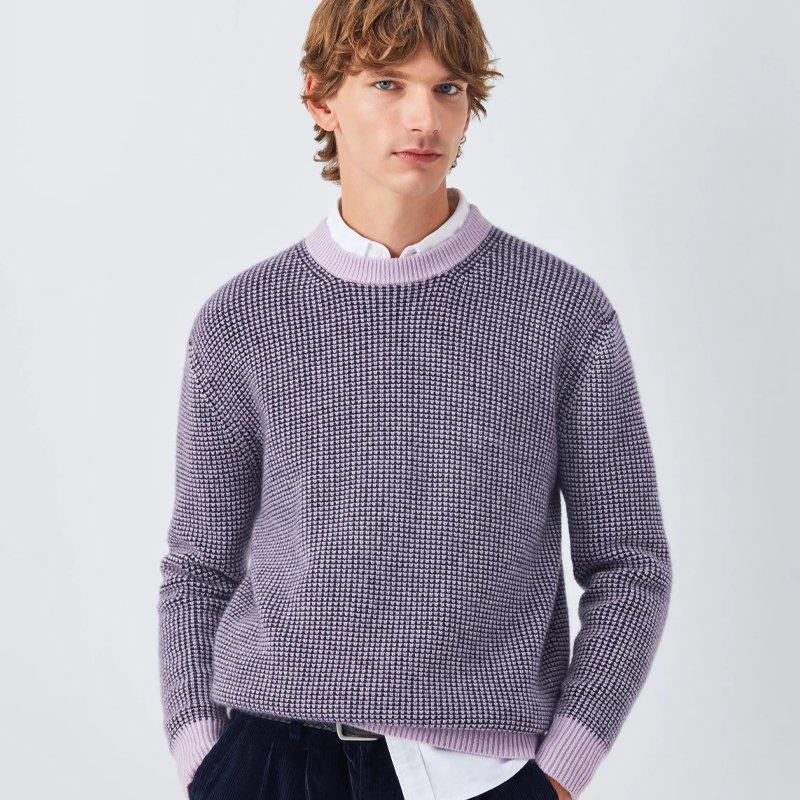 Male model wearing a purple cahsmere jumper