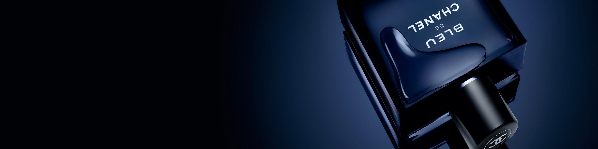product shot of chanel blue cologne on a dark blue background