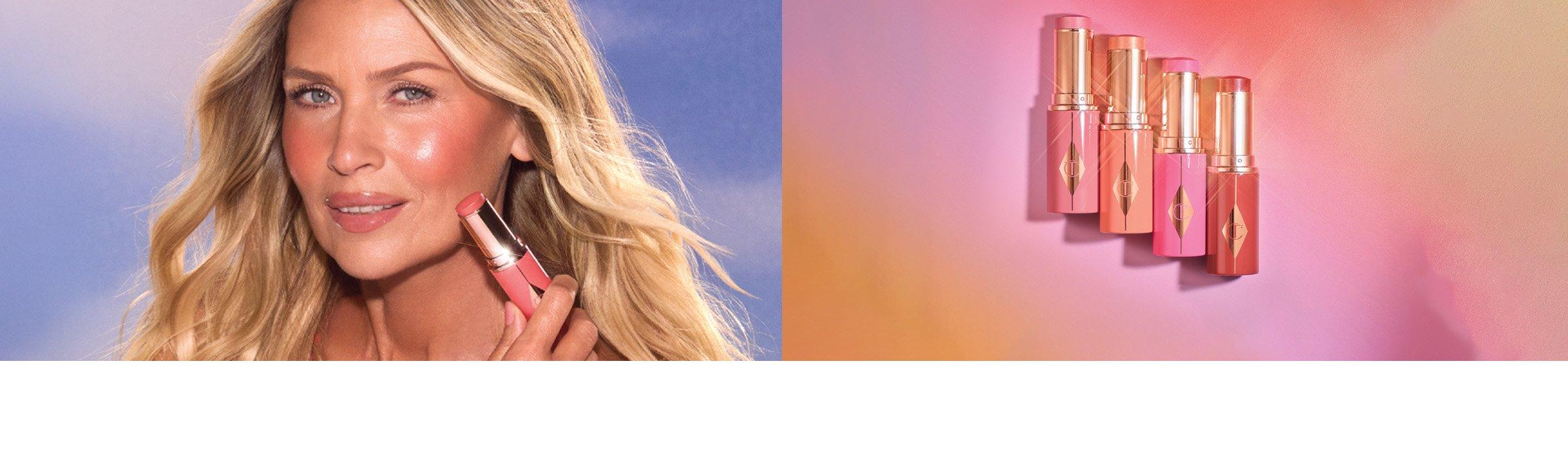 A woman with glowing skin, long blonde hair with Charlotte Tilbury’s Unreal Blush Healthy Glow Sticks