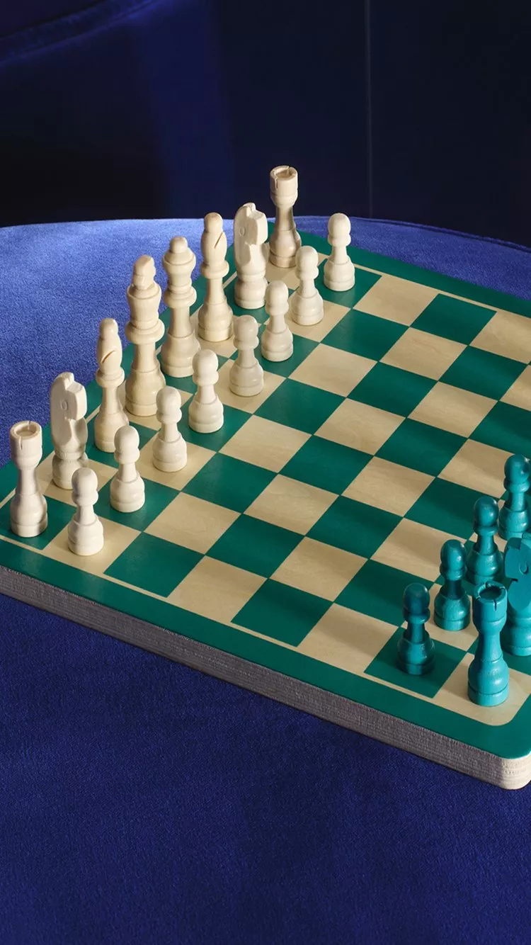 chess board on a blue velvet chair