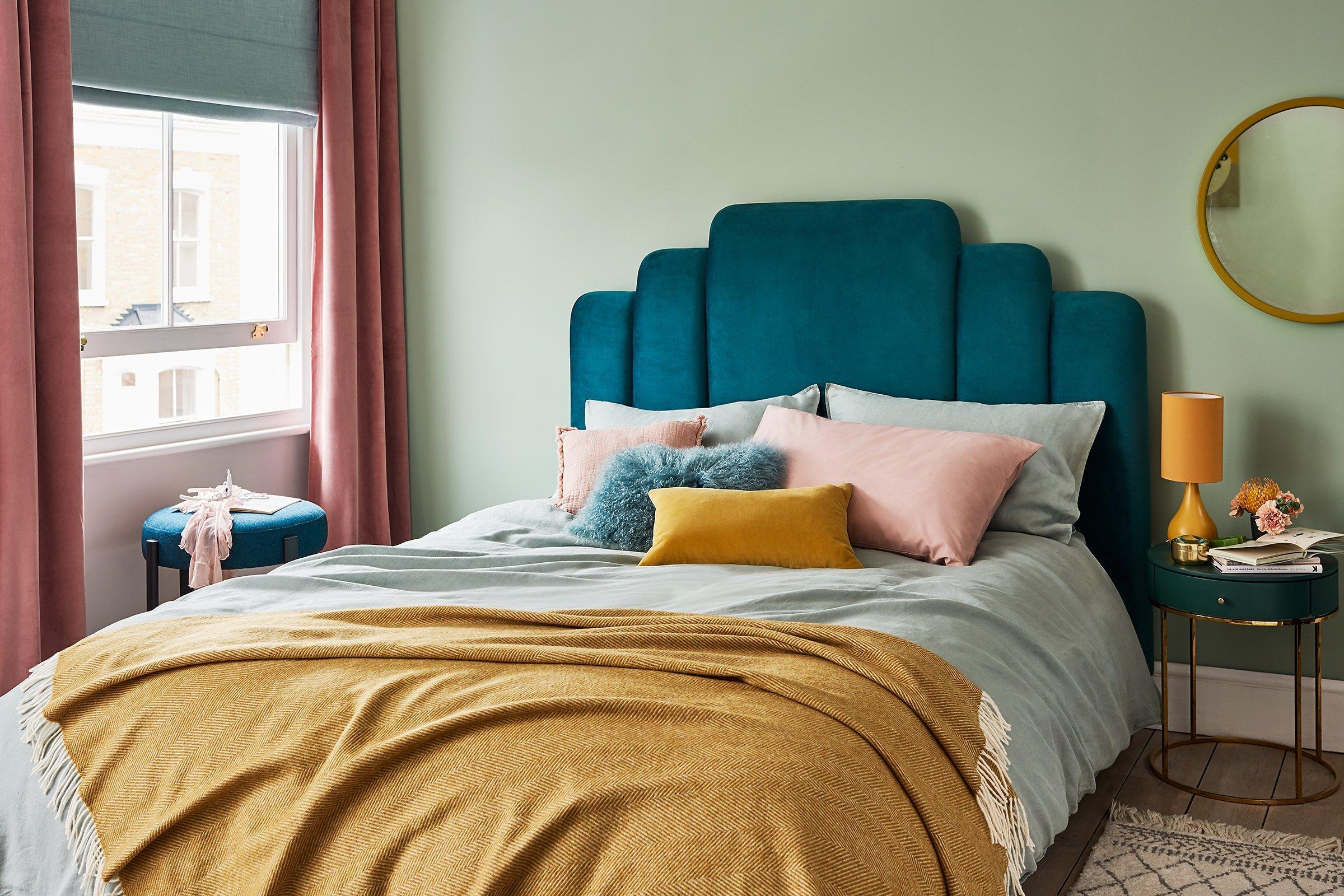 Contemporary Luxe - bed with blue head board. side table and lamp