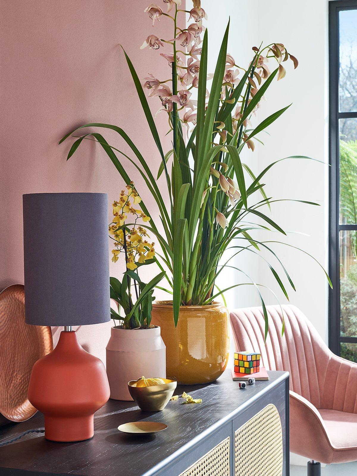 Contemporary Luxe - side cabinet with flowers and vases