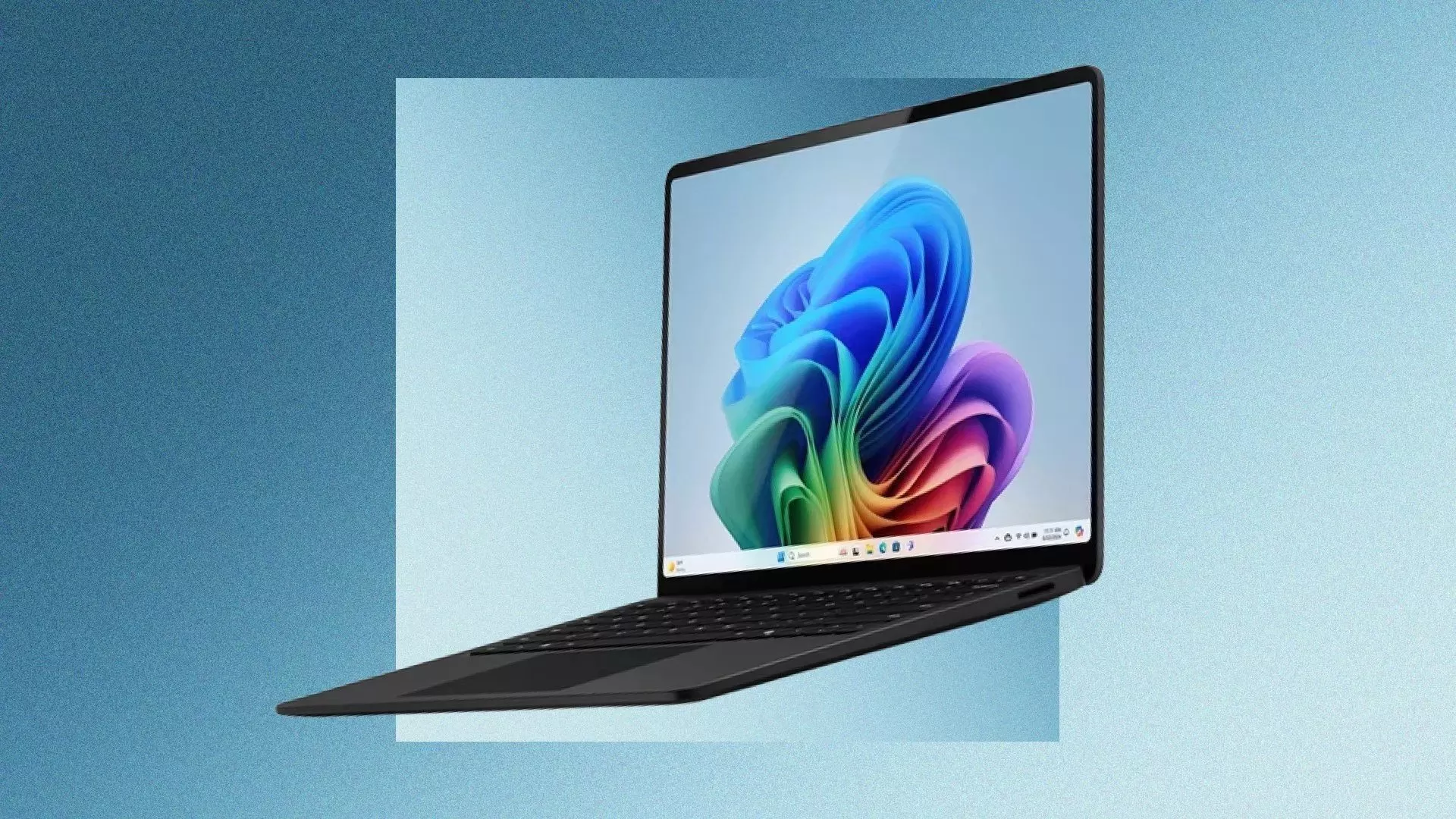 Sleek black laptop with Windows 11 desktop on screen, floating on blue background, modern portable computer image
