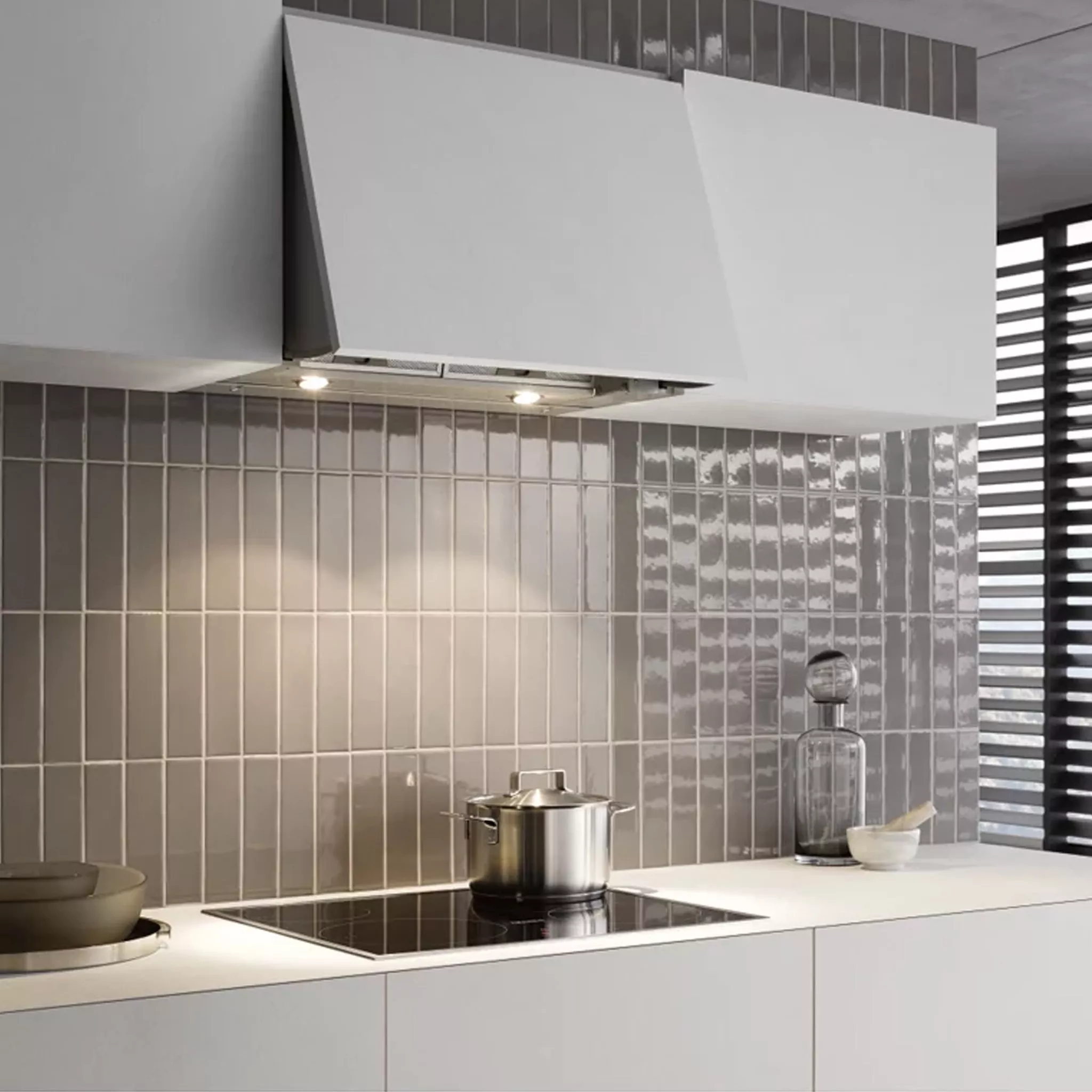 Cooker hood above a hob 