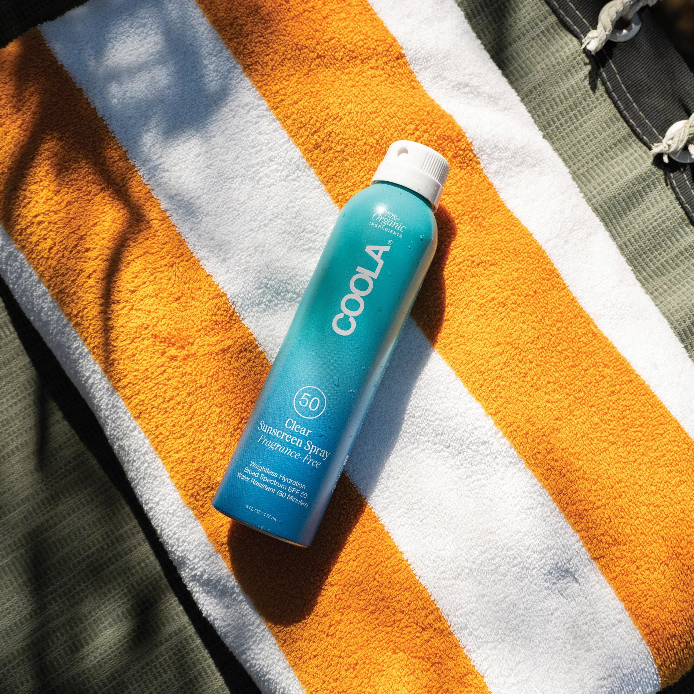 photo of a coola product on a beach towel in a garden