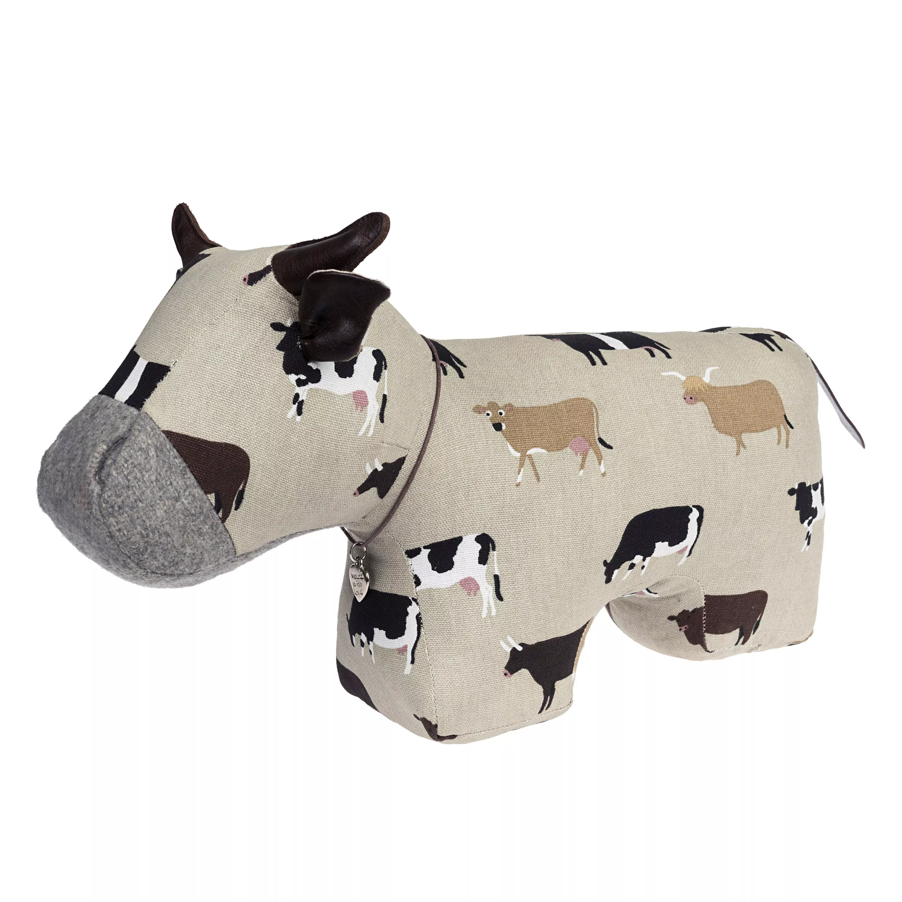 Farm animal print fabric doorstop shaped like a cow, with grey felt snout and leather ears on white background