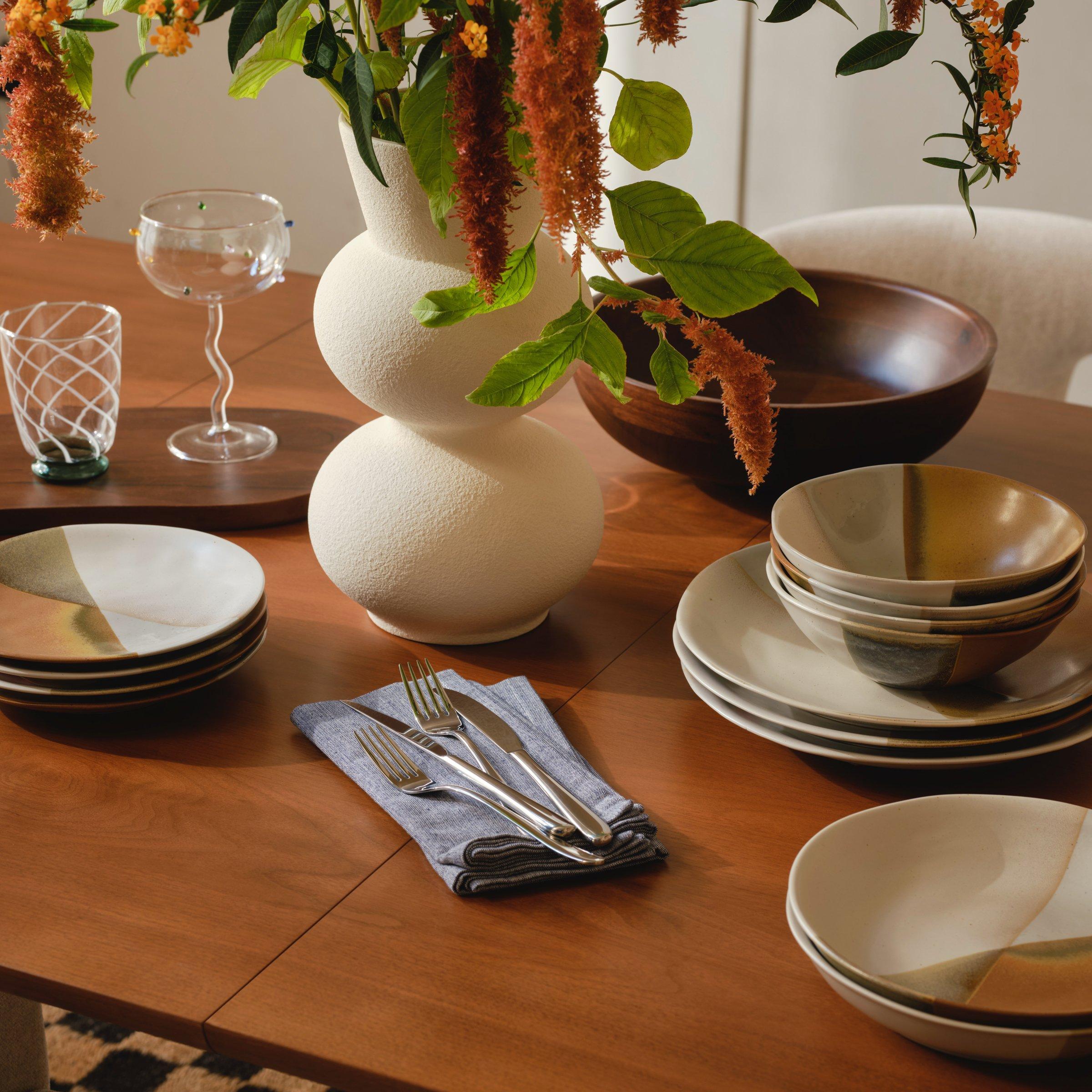 Tableware and glassware on wooden table