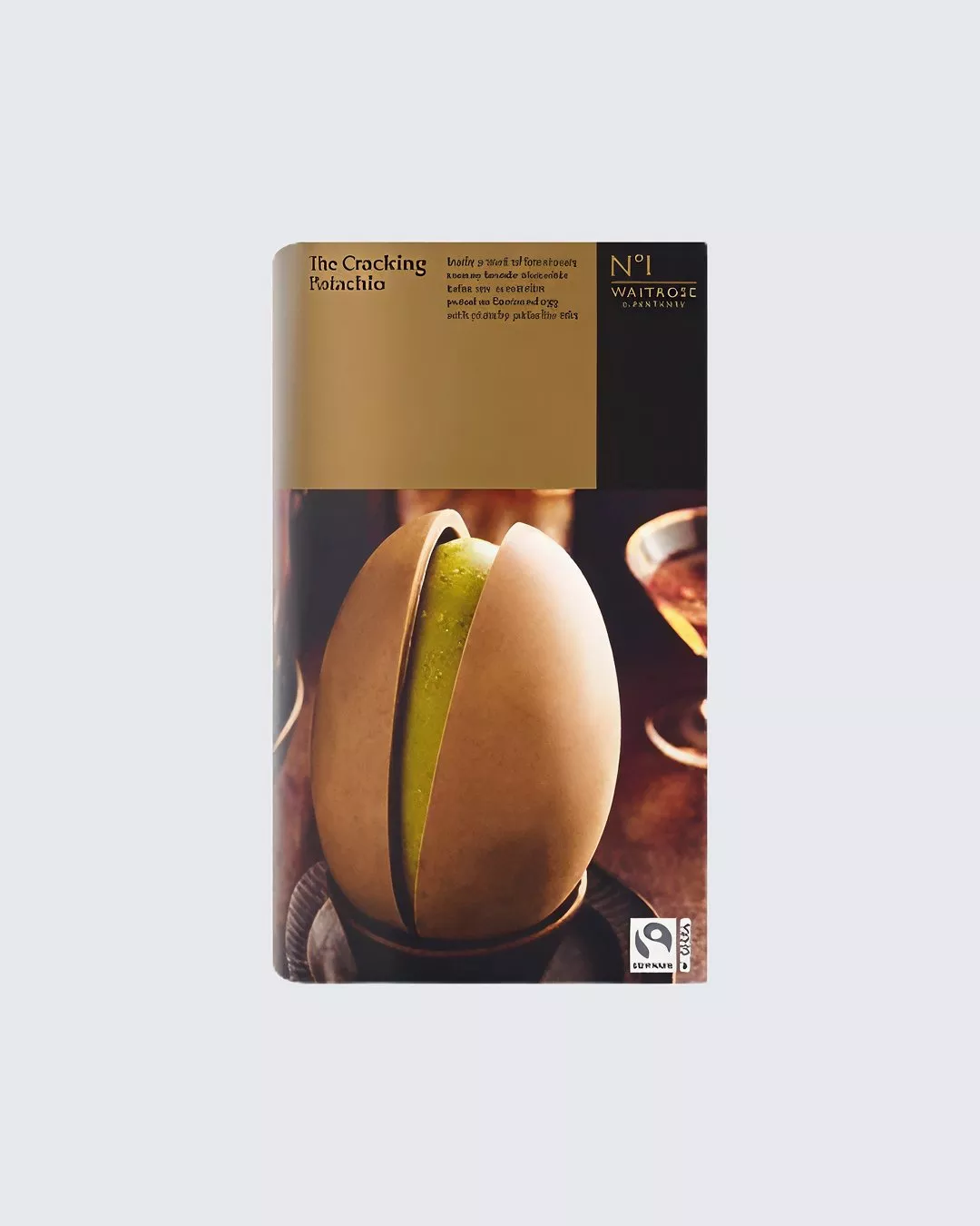 Packaging of a Waitrose pistachio Easter egg, featuring a smooth chocolate shell with a green filling.
