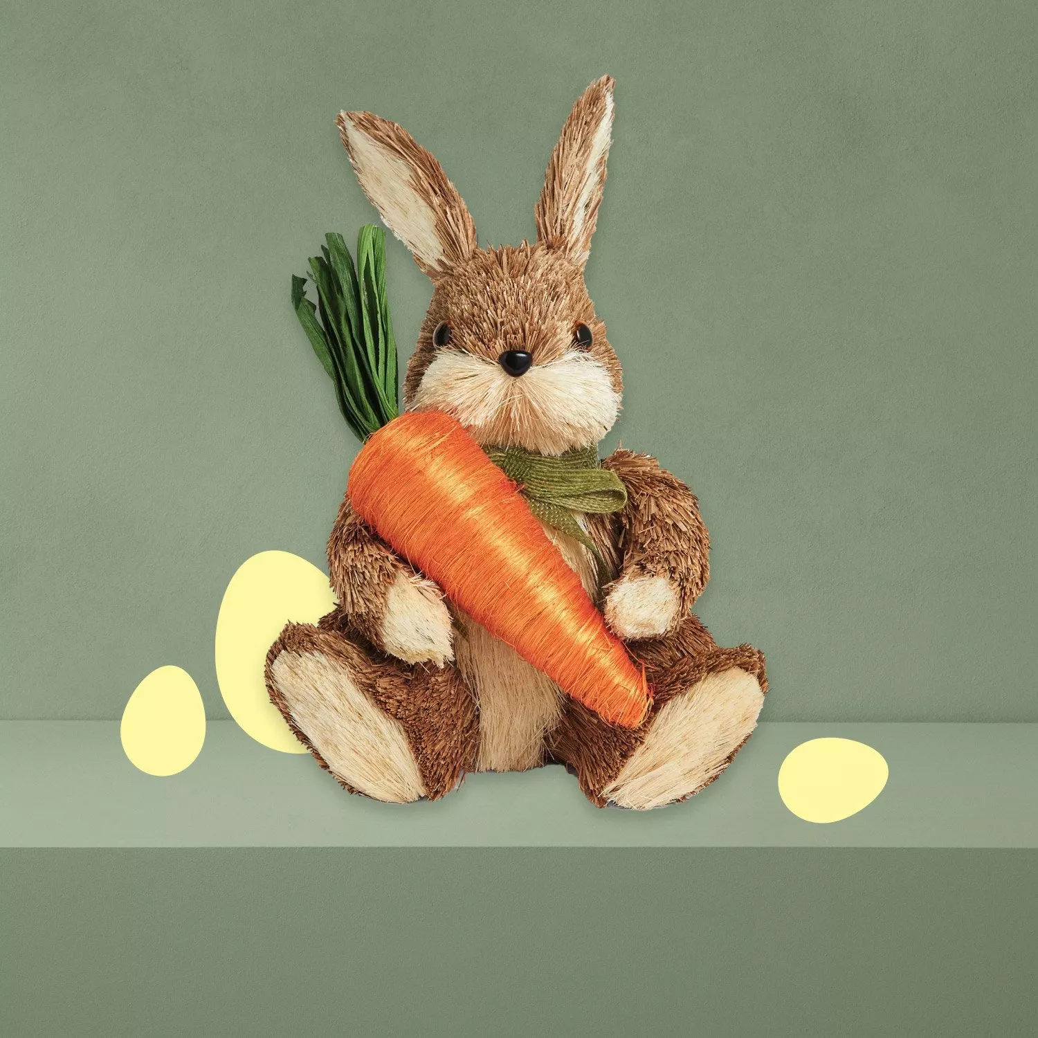 Easter brown bunny holding carrot