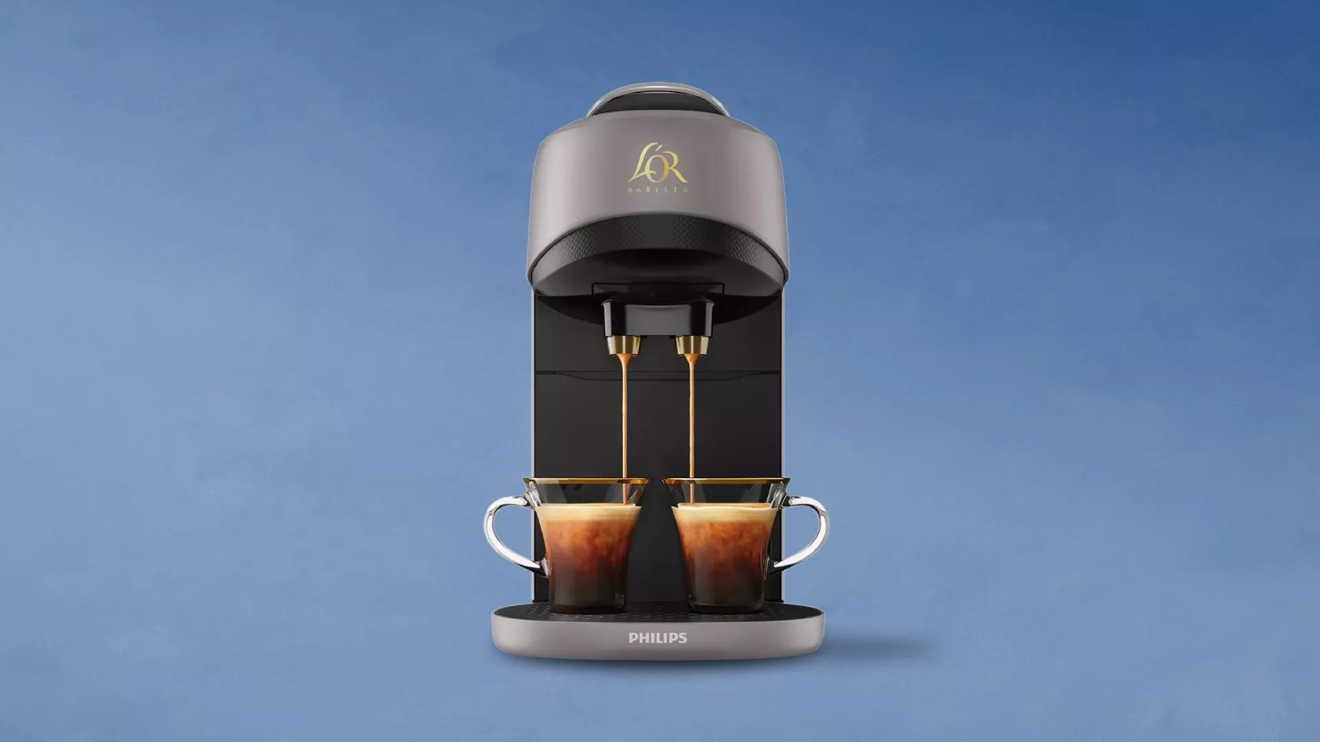 Modern coffee machine dispensing two cups of espresso against a blue background, showcasing sleek design.