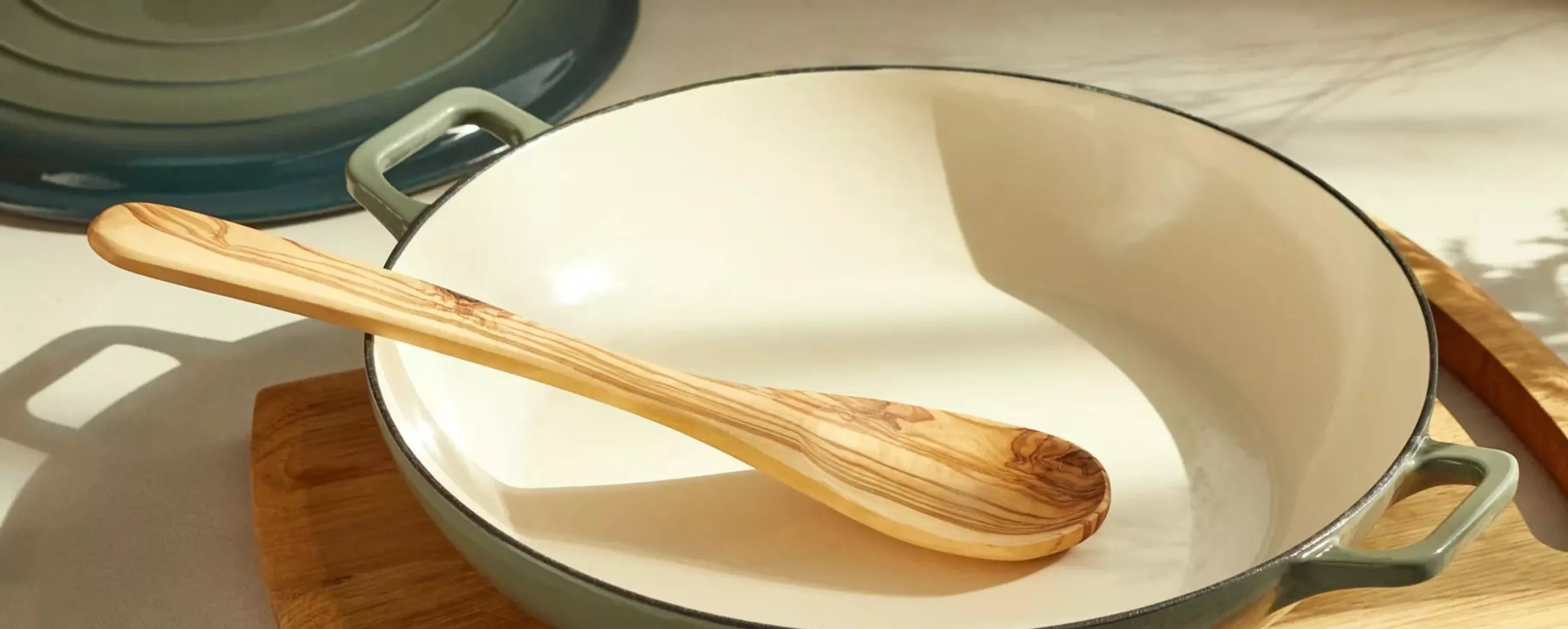 green casarole dish on a kitchen top