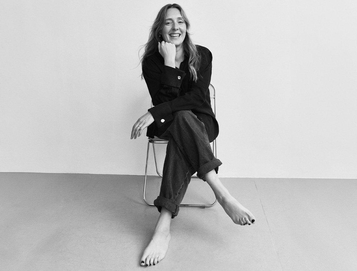 Amy Powney seated
