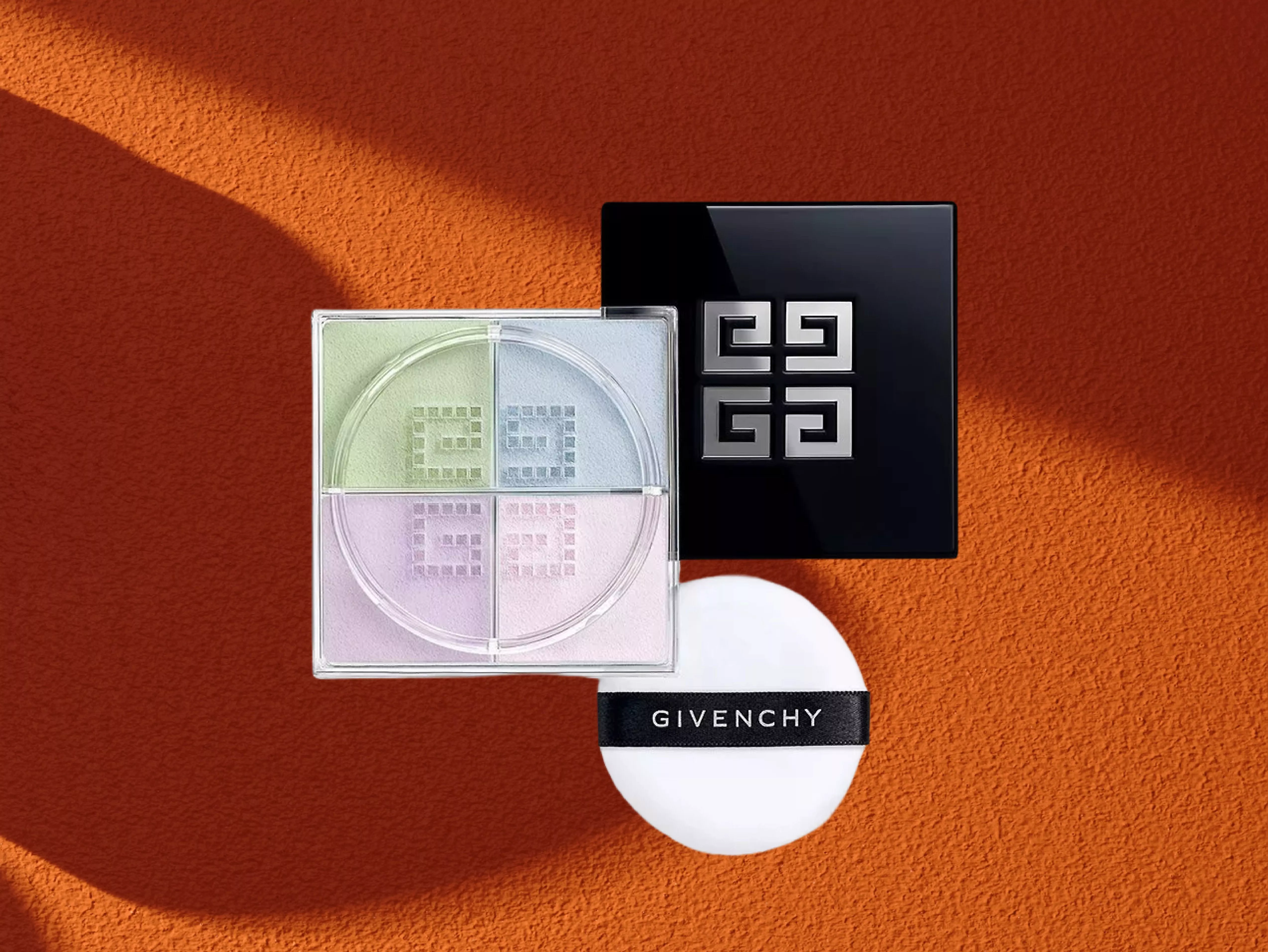 Givenchy Prisme Libre Loose Setting and Finishing Powder on a orange background