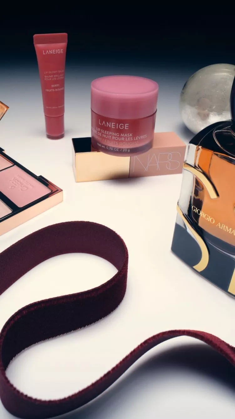 selection of beauty products in a spotlight