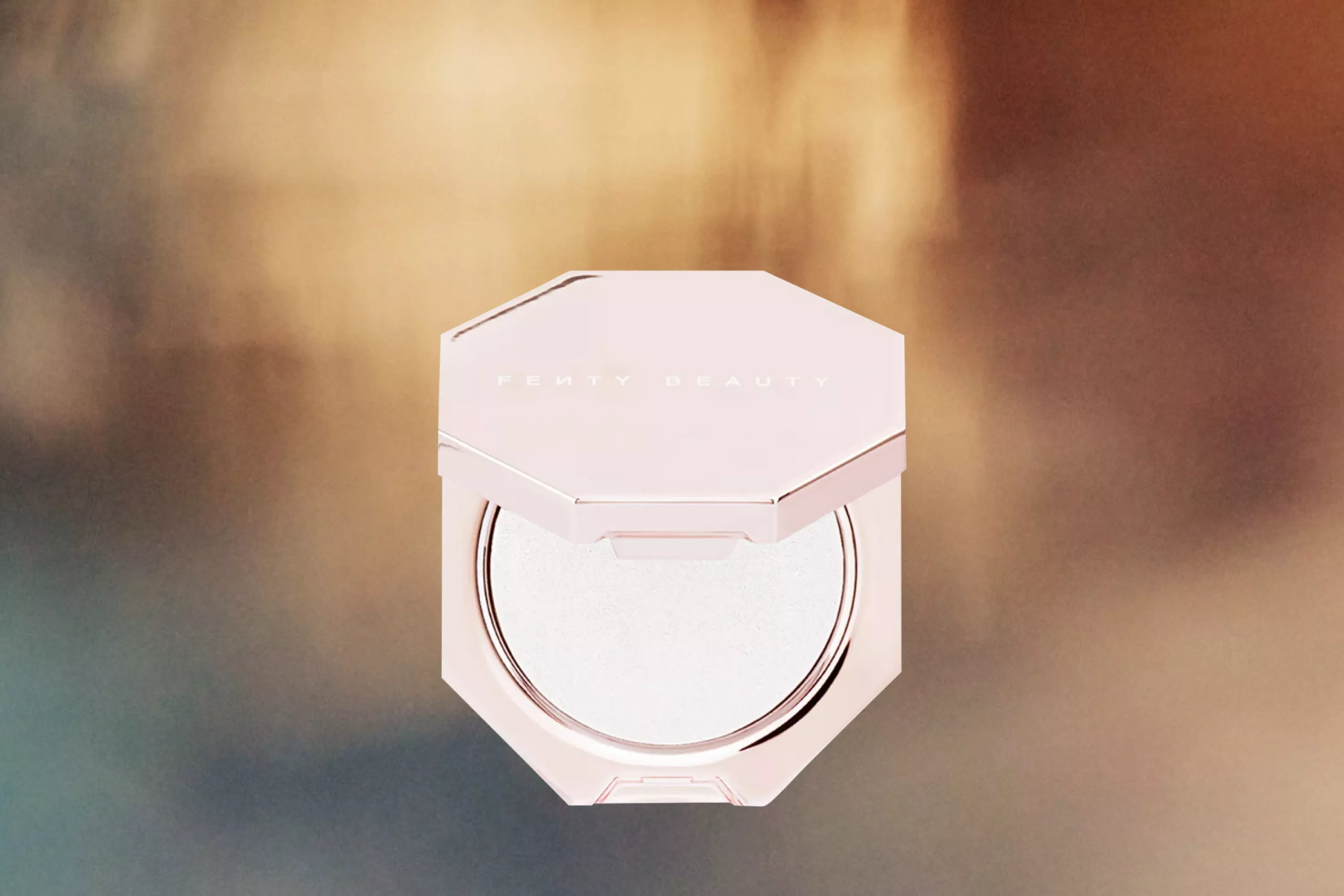 FentyBeauty Diamond Bomb cutout on a mottled background