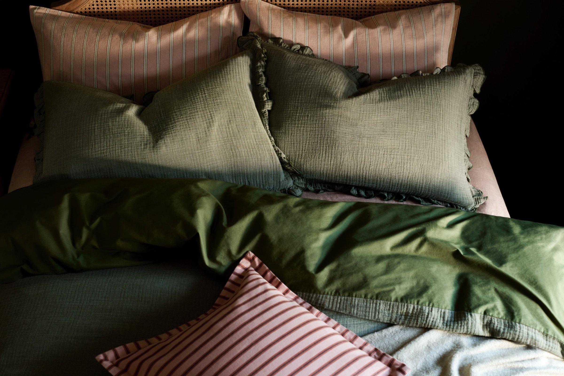 Various patterned pillowcases and a duvet cover