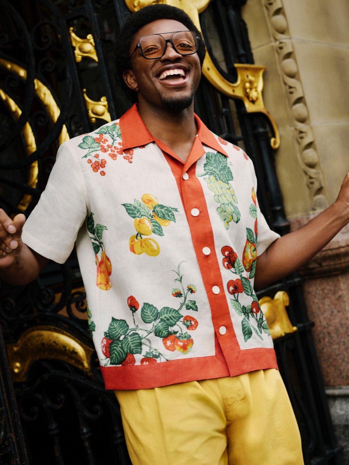 Chris standing in Liverpool with a smile