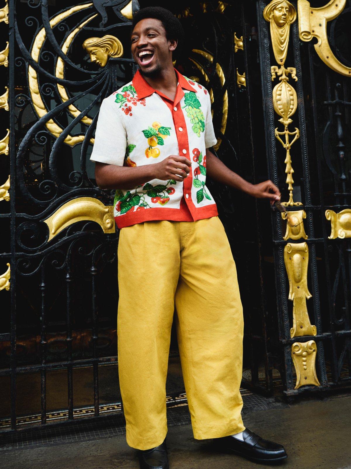 Chris standing in Liverpool with a smile