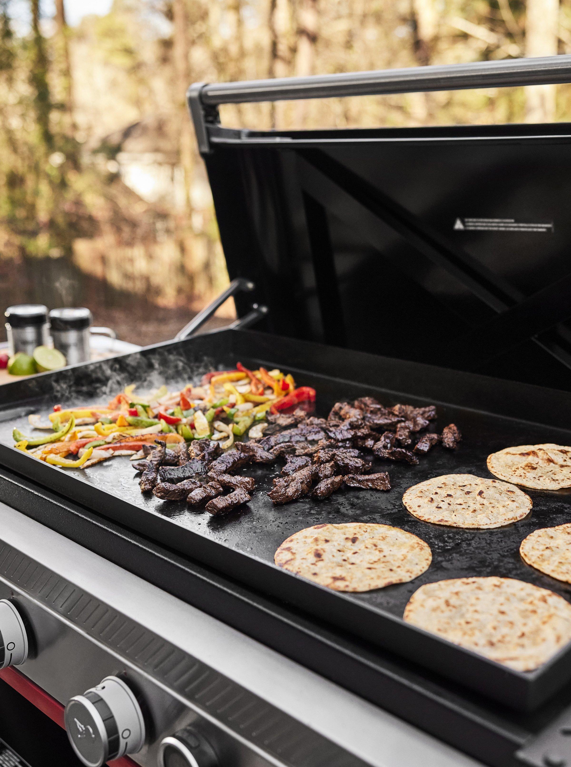 Grilling vegetables, meats, and breads on a Weber Slate Premium Griddle GPS6 Gas Grill