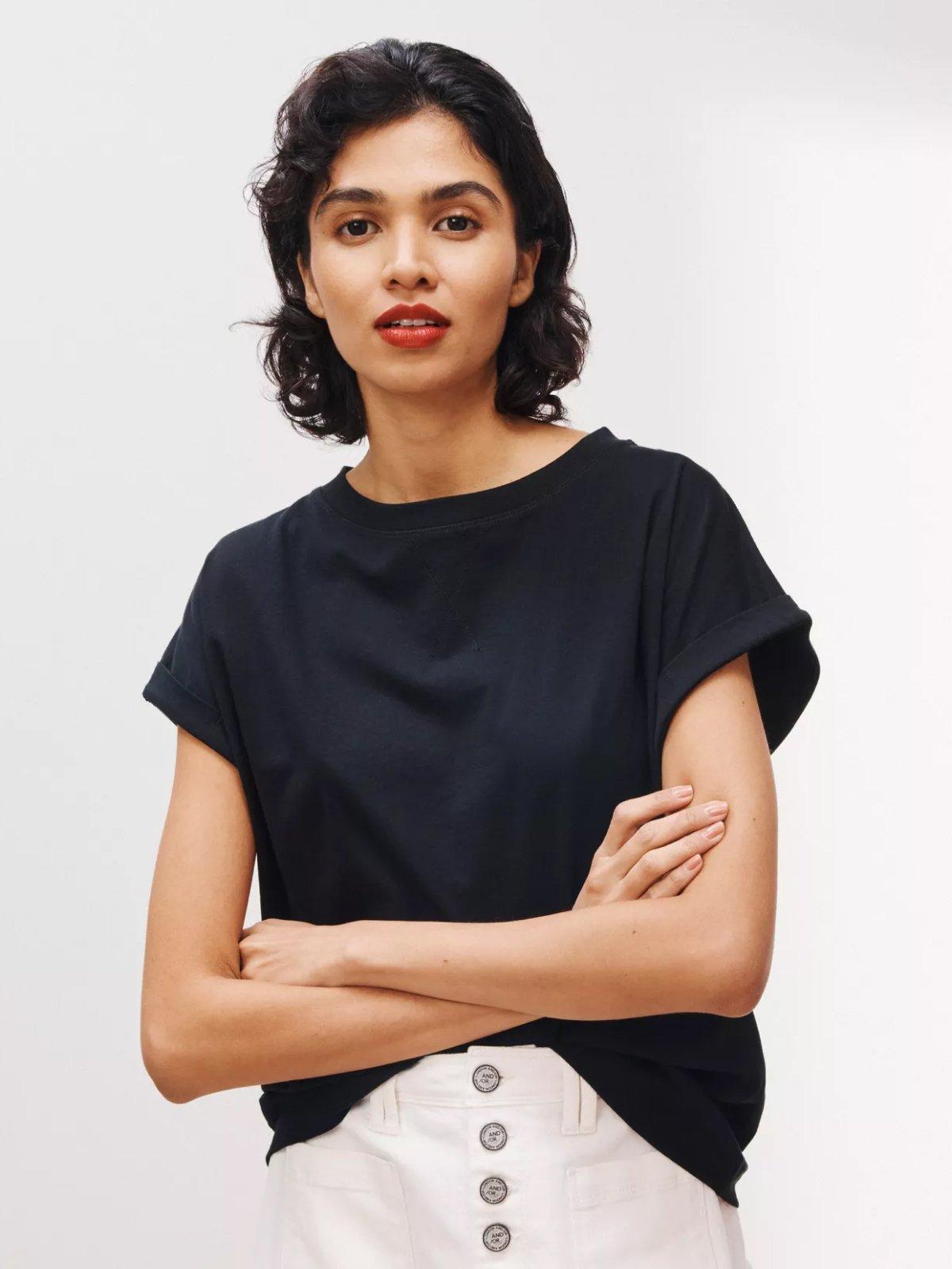 Female model wearing AND/OR Turn Up Sleeve Tank T-Shirt