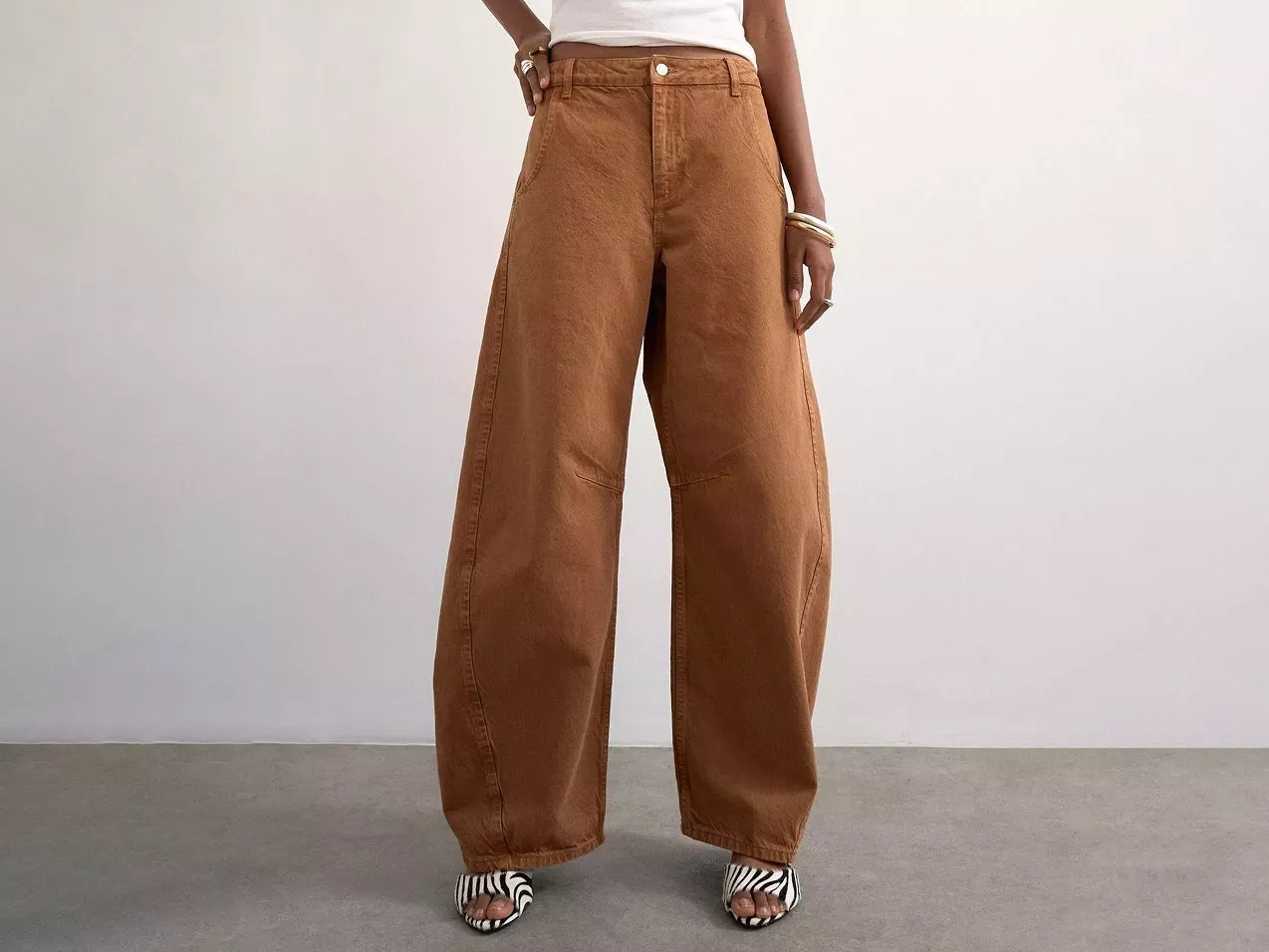 Topshop High Rise Horseshoe Barrel Leg Jeans in brown.