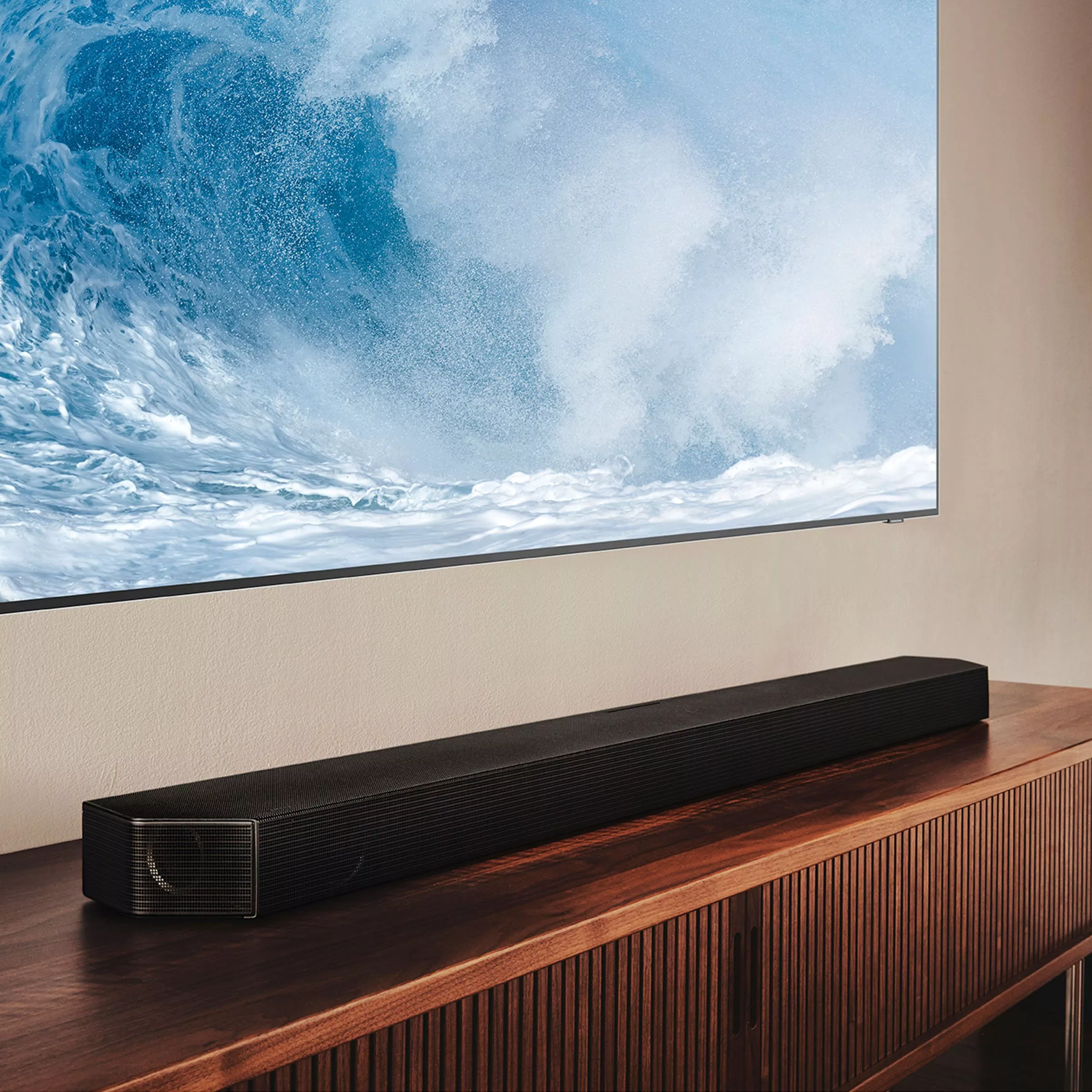 Wall mounted TV with soundbar on the console table 