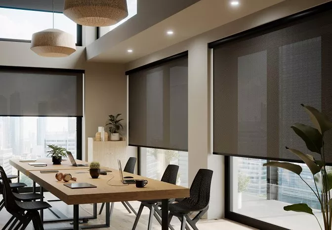 Dining room with electric blinds half closed on the windows