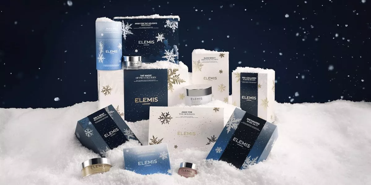 This is a logo for Elemis featuring their products on a snowy background