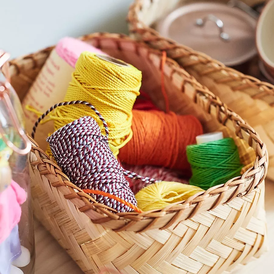 a basket of craft accessories