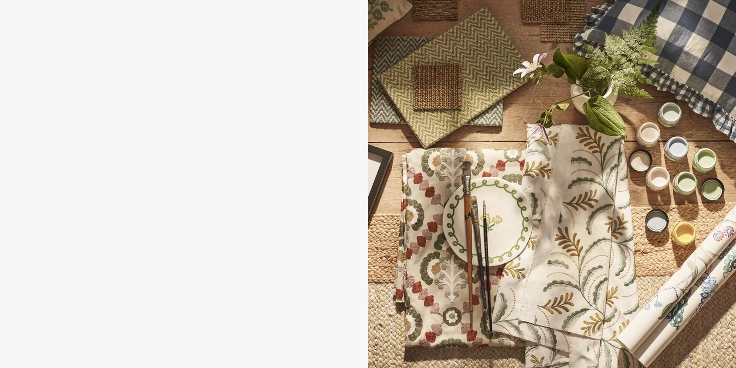 Table with fabrics scattered over it