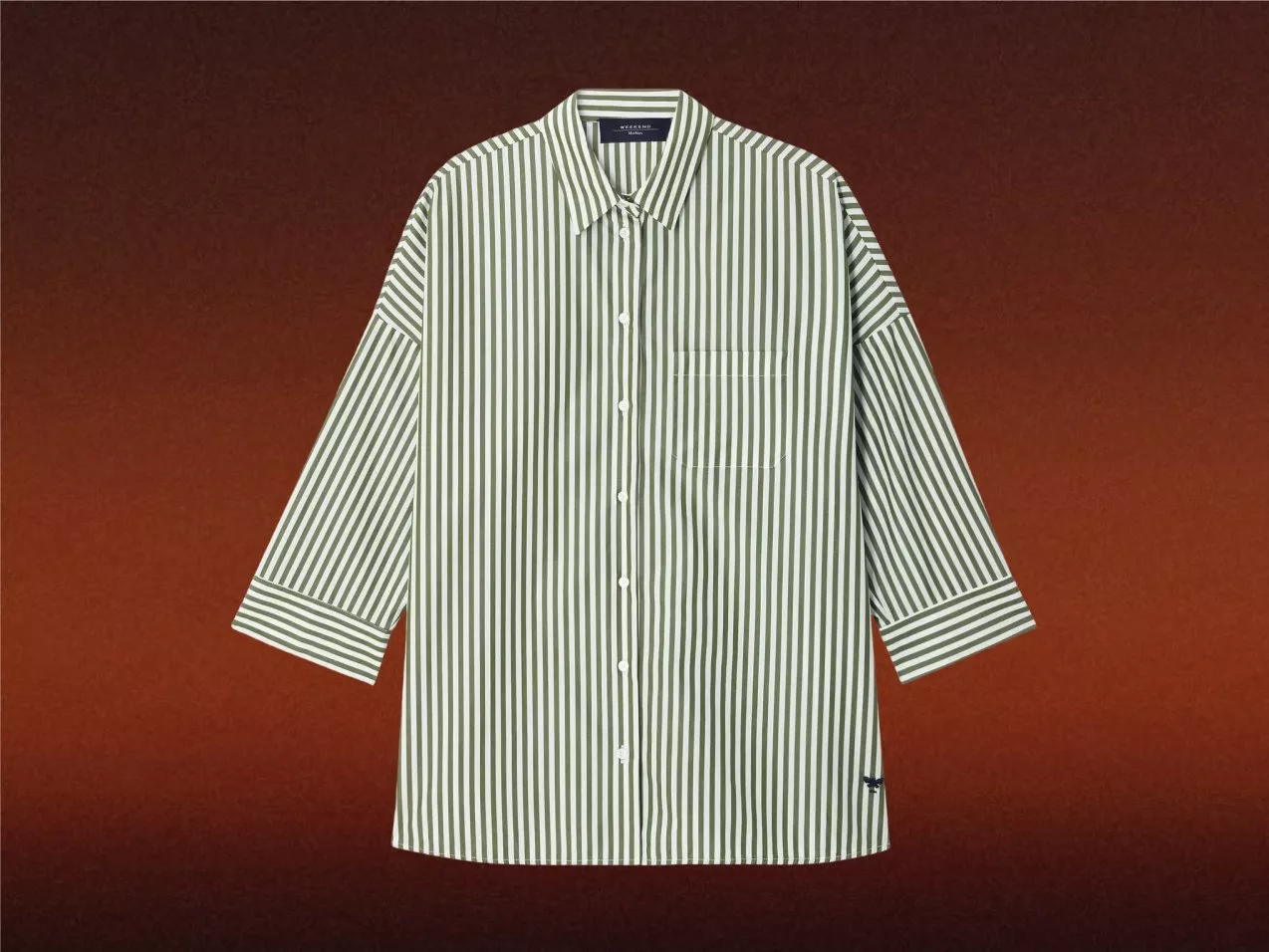 Green and white striped button-up shirt with three-quarter sleeves and chest pocket on a brown background