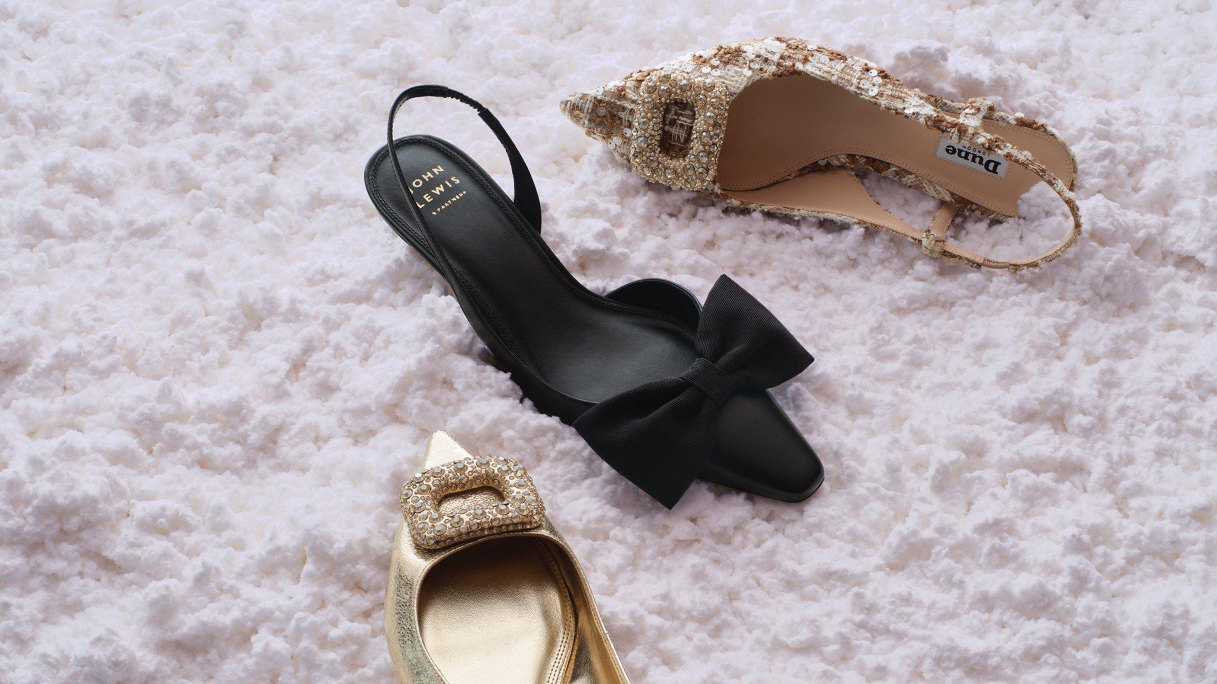 High heel shoes laying in the snow