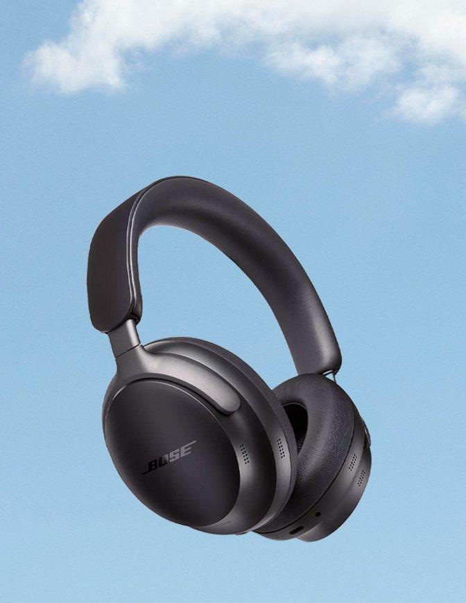 Headphones against sky and cloud background