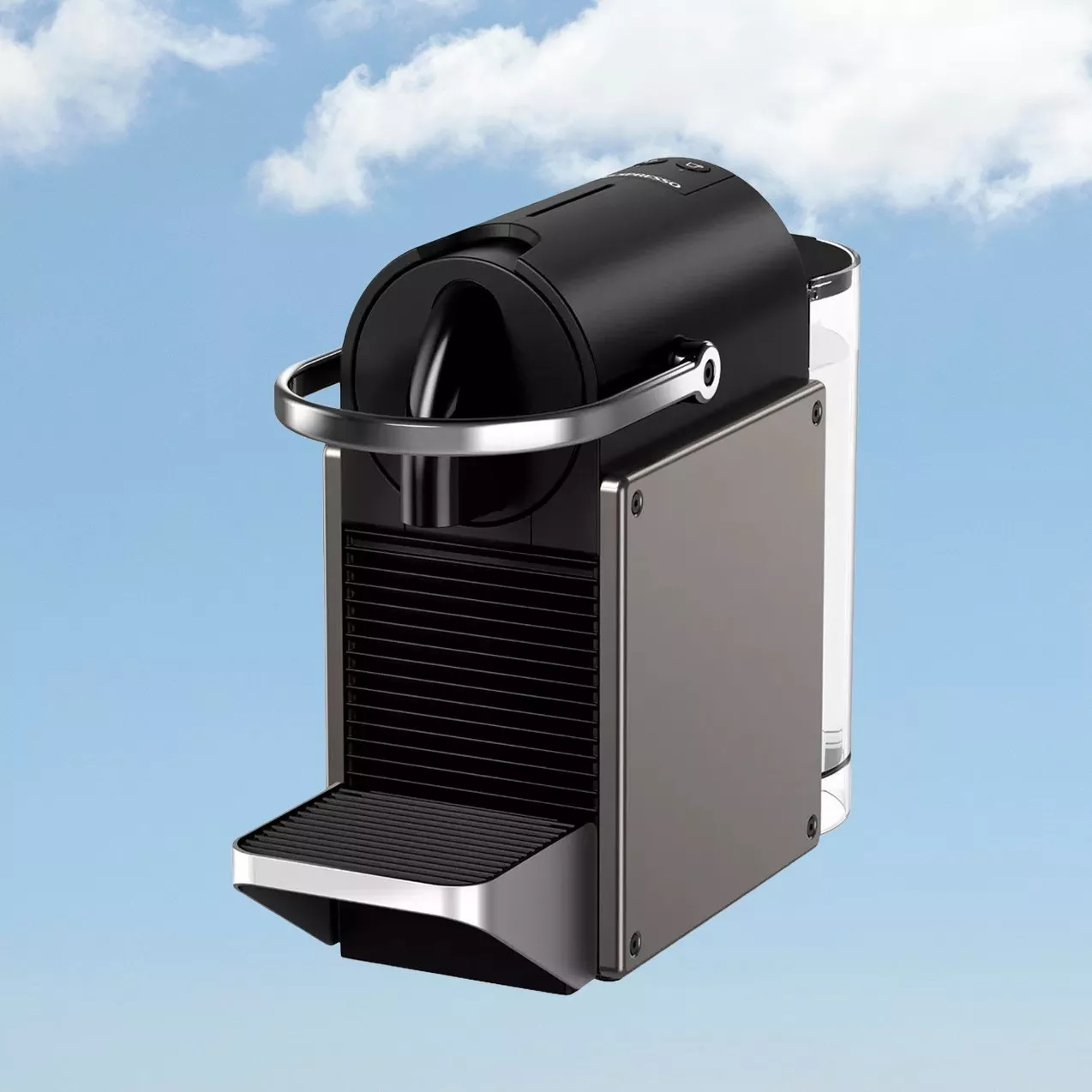 Compact pod coffee machine with water tank and drip tray, ideal for quick espresso at home or office