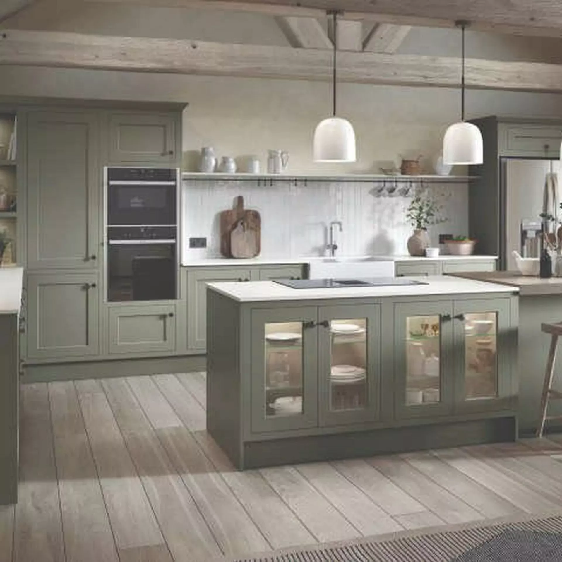 Kitchen setting with navy cabinets and white counters