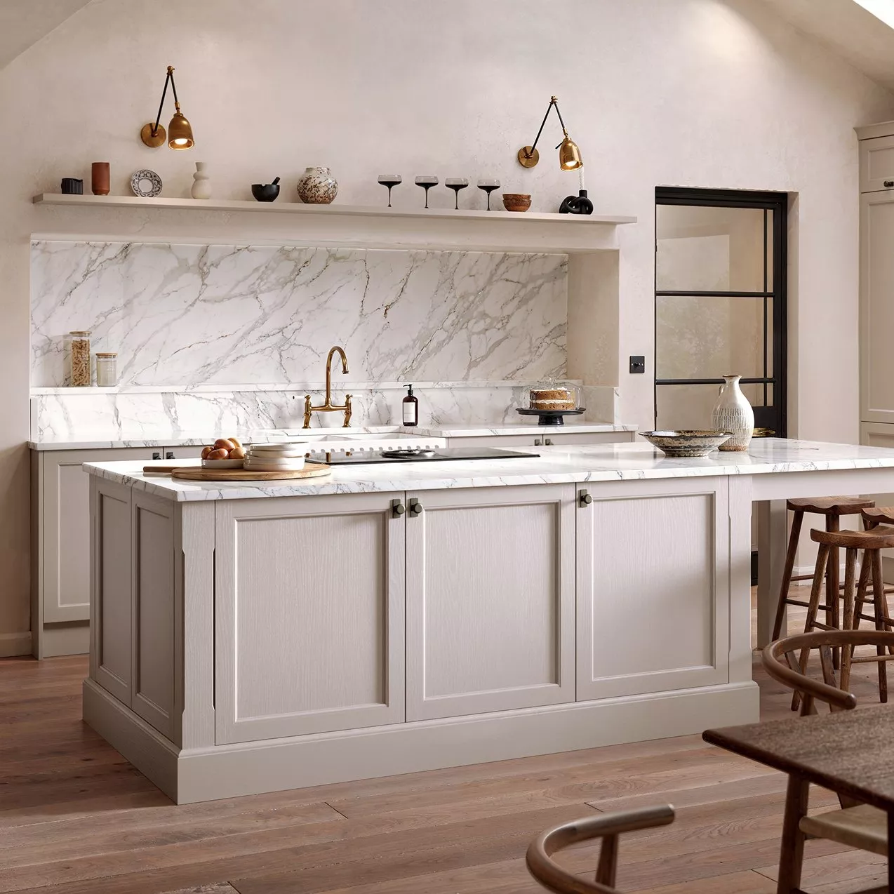 Grey fitted kitchen with dining table